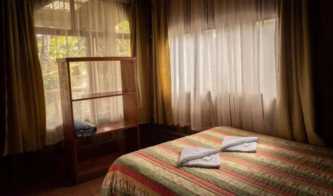 Bed in Vista Turrialba Lodge