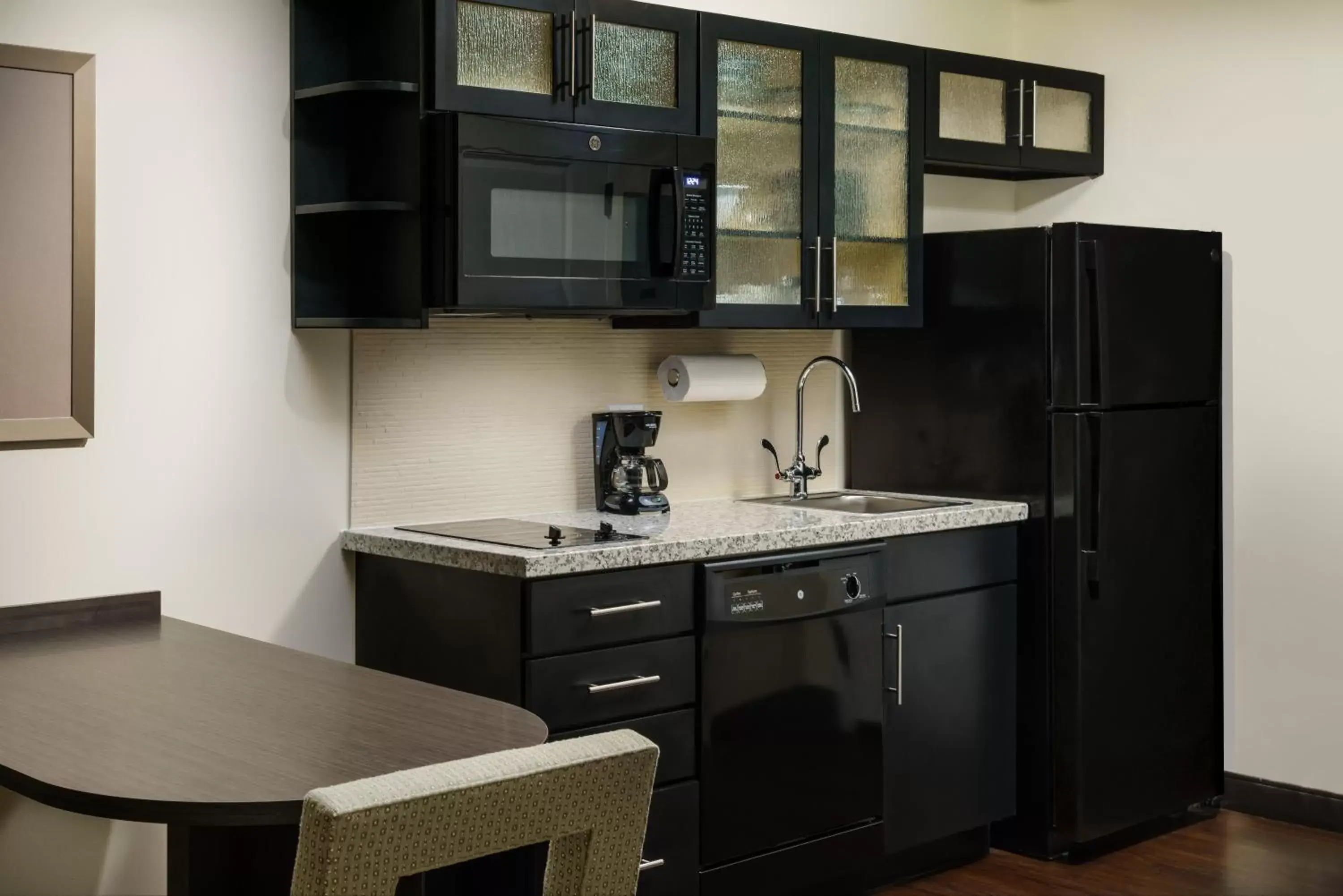 Kitchen or kitchenette, Kitchen/Kitchenette in Candlewood Suites - Orlando - Lake Buena Vista, an IHG Hotel