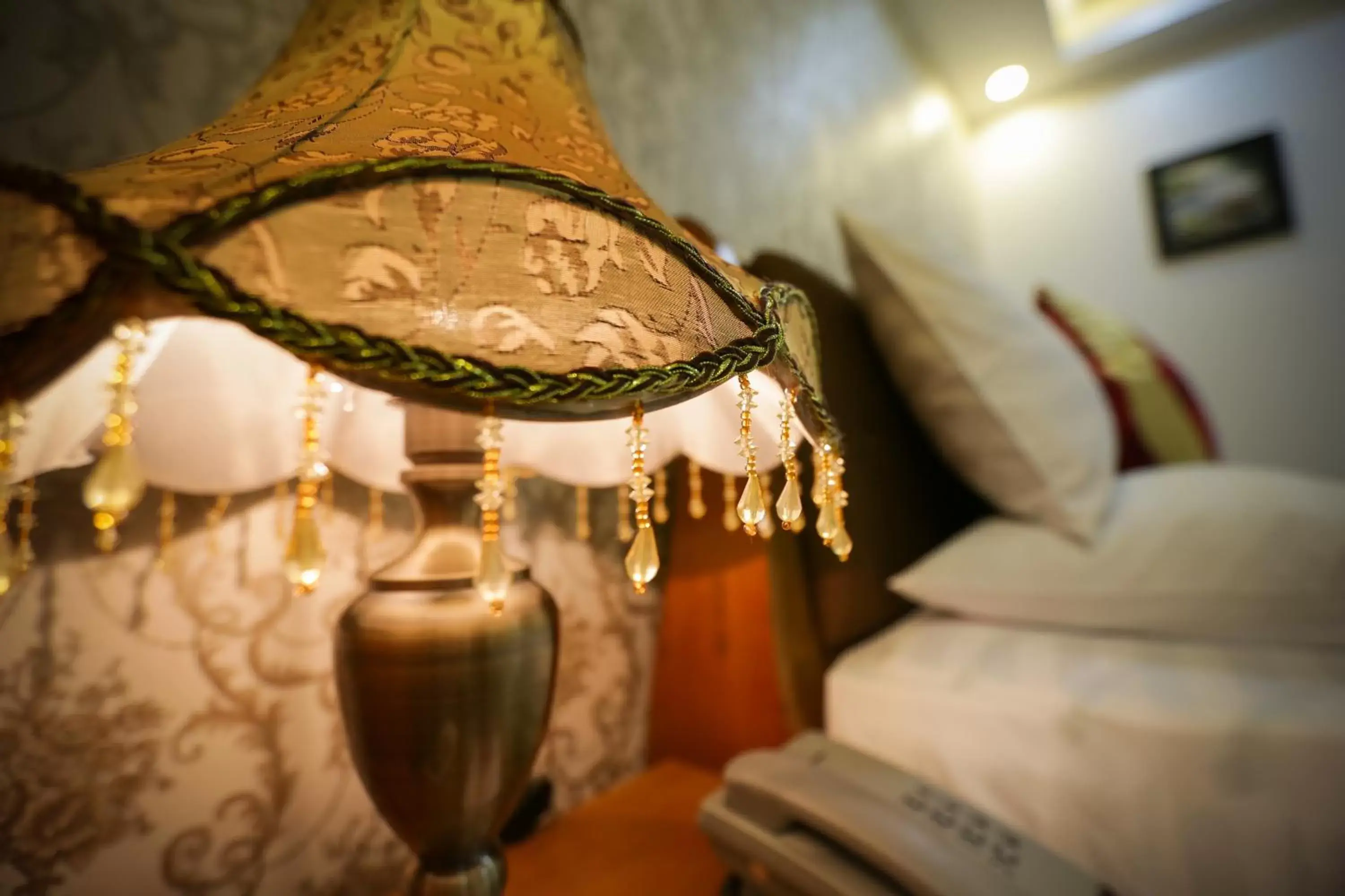 Decorative detail, Bed in The Airport Hotel Decorative detail, Bed in The Airport Hotel