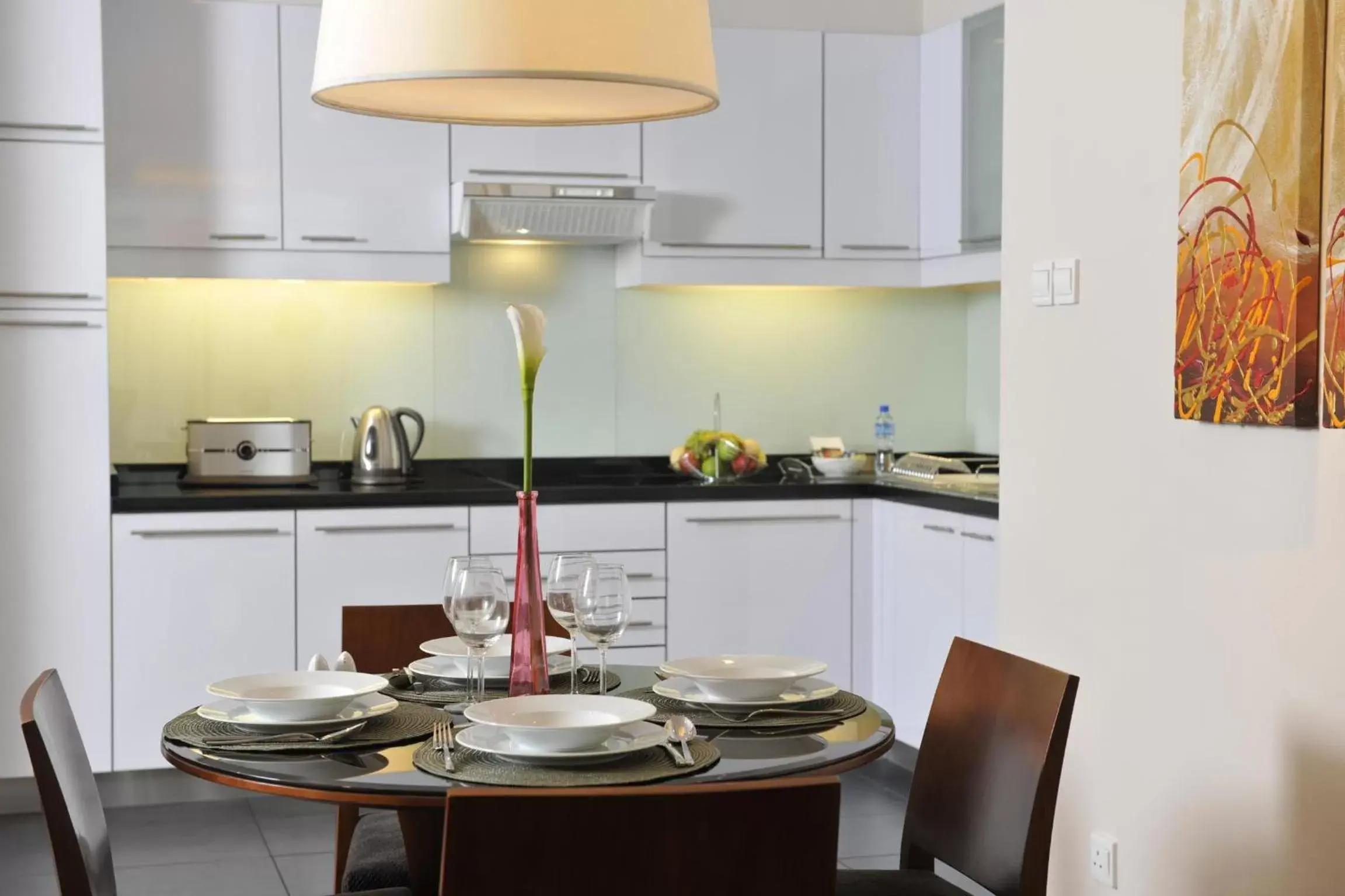Kitchen or kitchenette, Dining Area in Fraser Suites Seef Bahrain