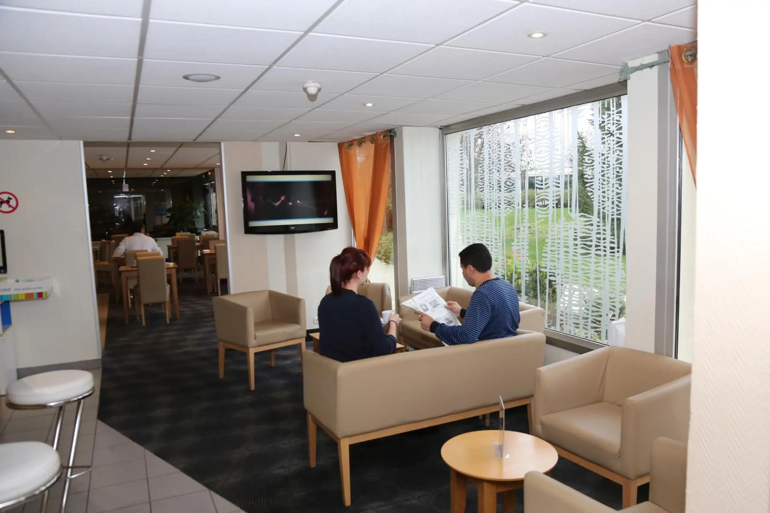 Lounge or bar in ibis Styles Orleans