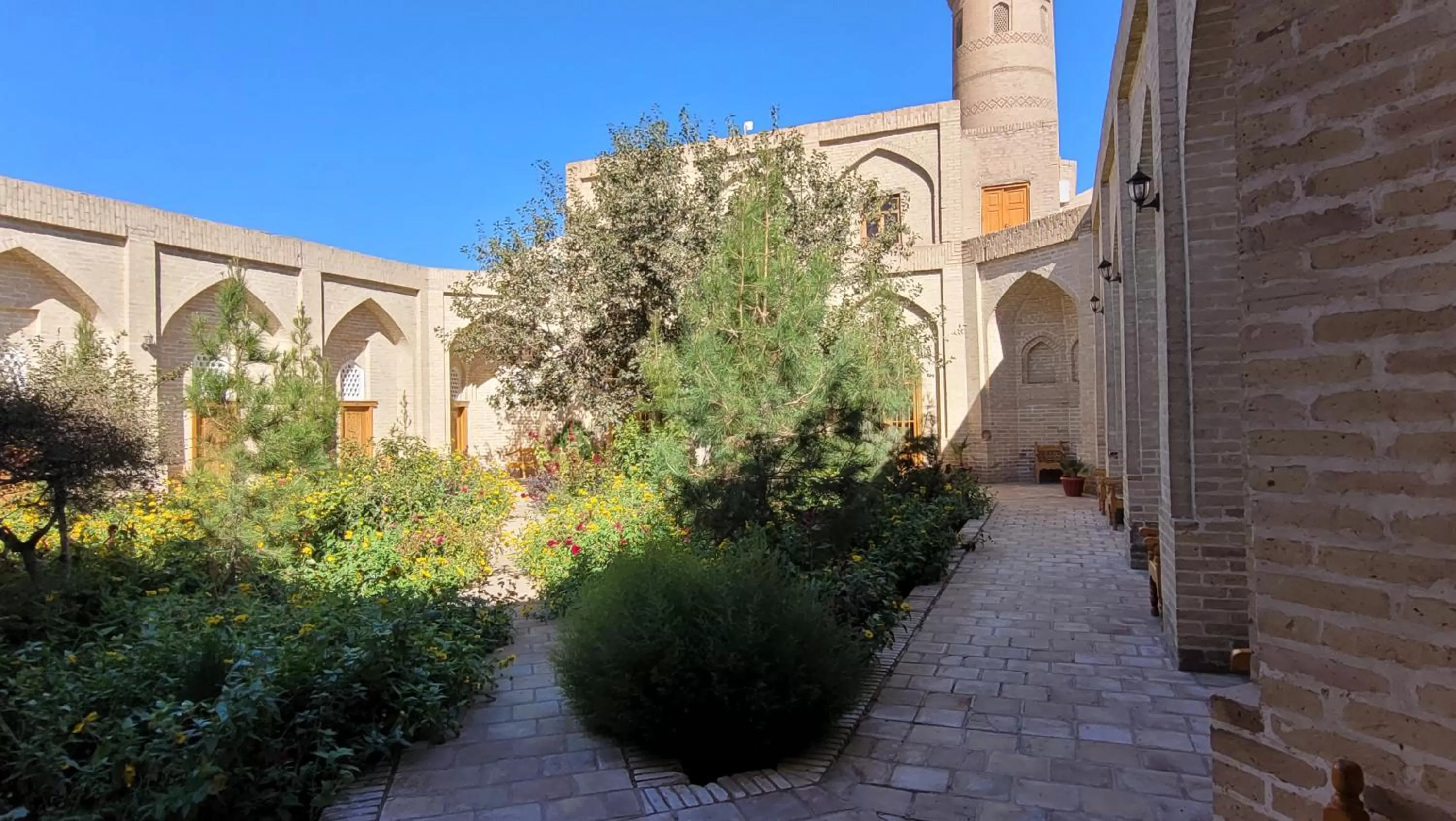 Garden in madrasah Polvon-Qori boutique hotel XIX century