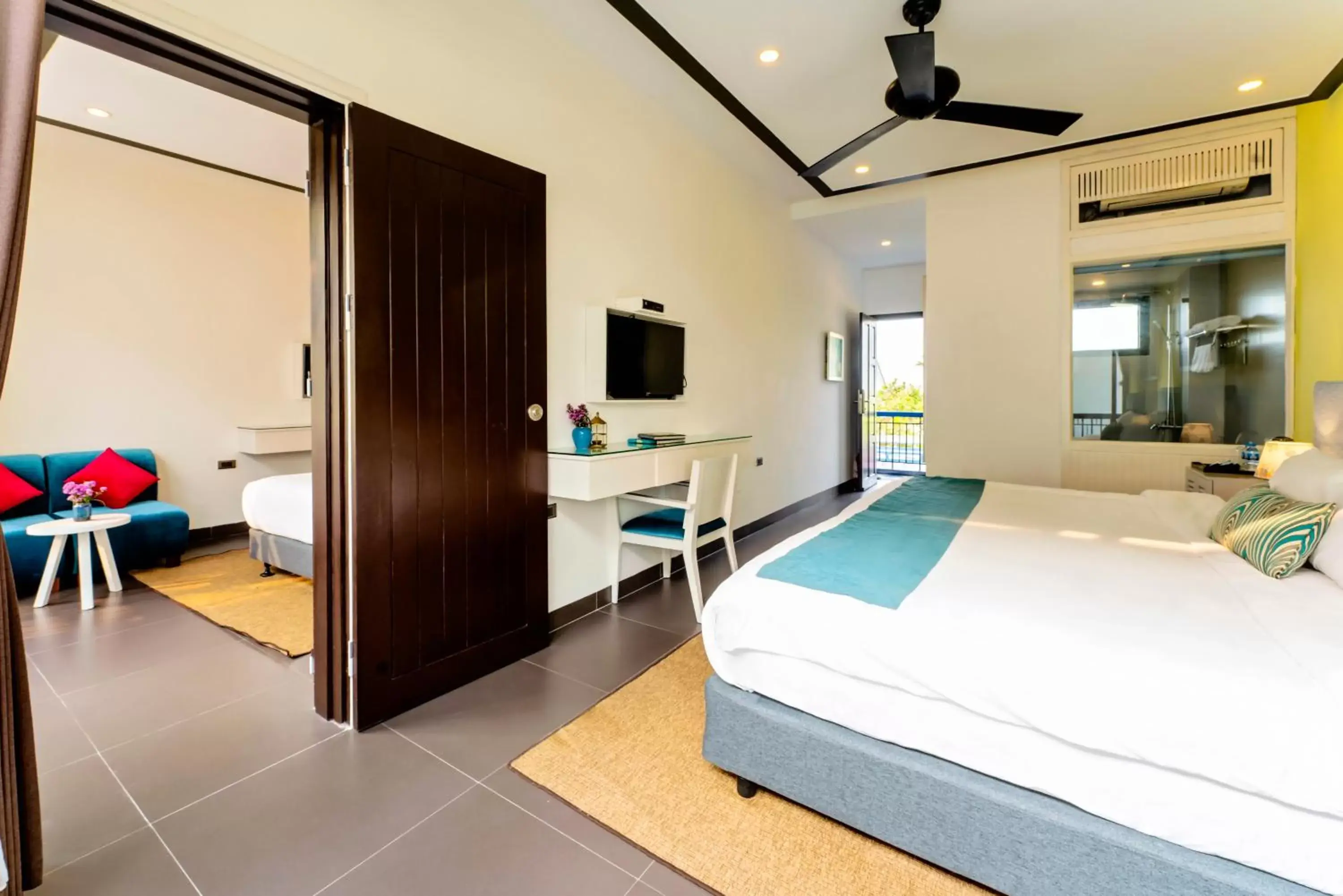 Communal lounge/ TV room, Bed in Lavini Hoian Boutique Villa