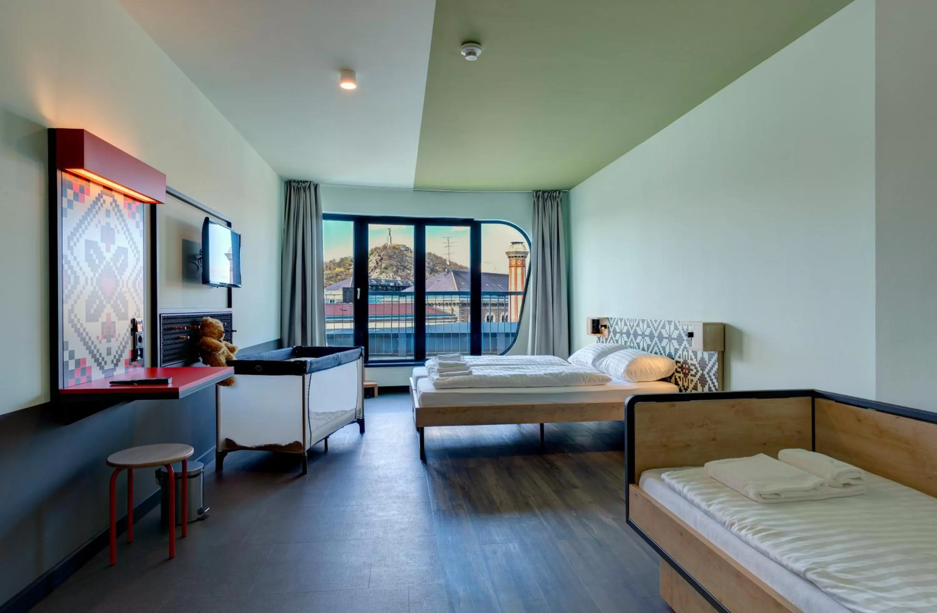 Photo of the whole room, Bed in MEININGER Budapest Great Market Hall