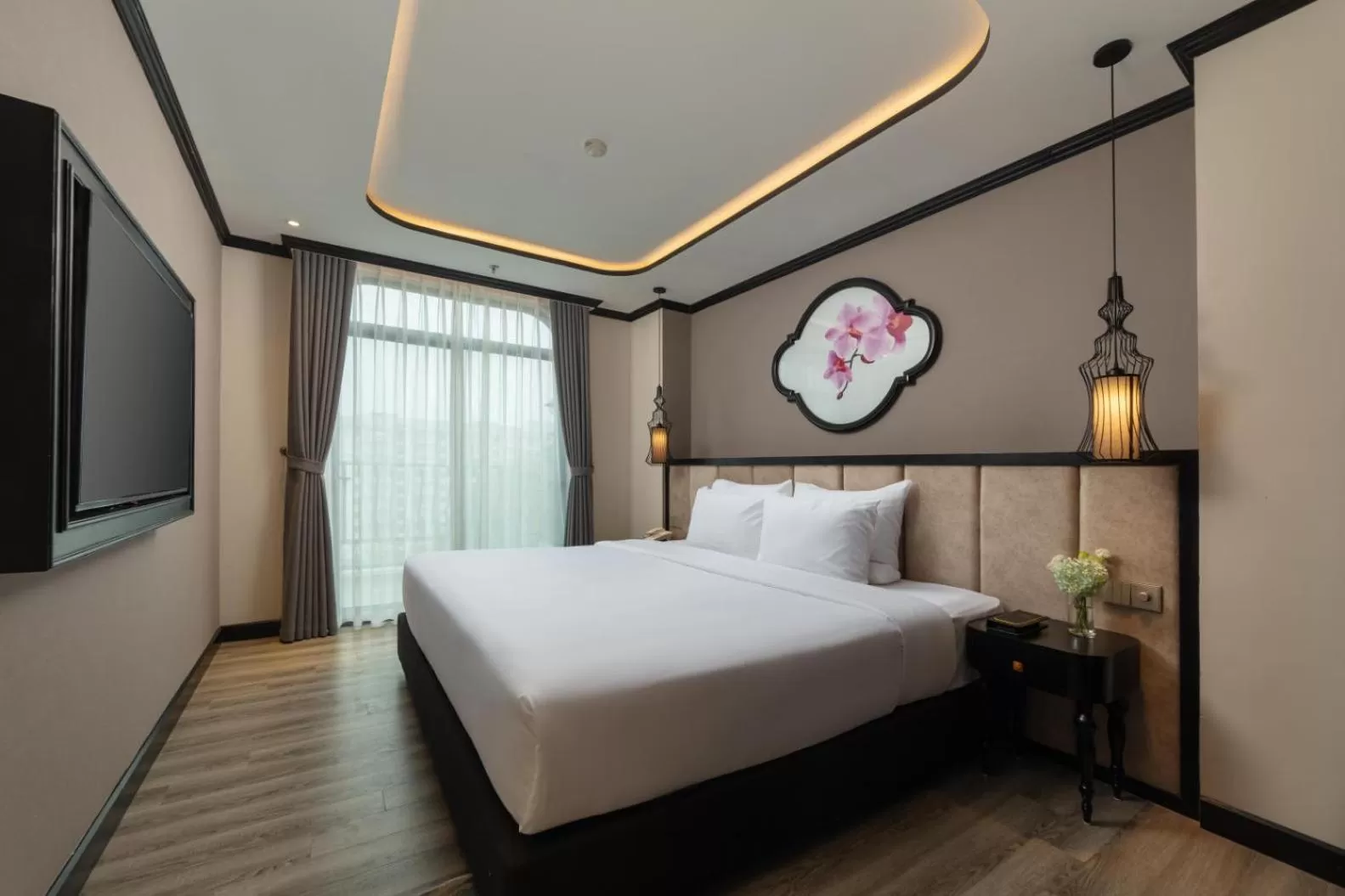 Communal lounge/ TV room, Bed in FTE Ba Dinh Hotel