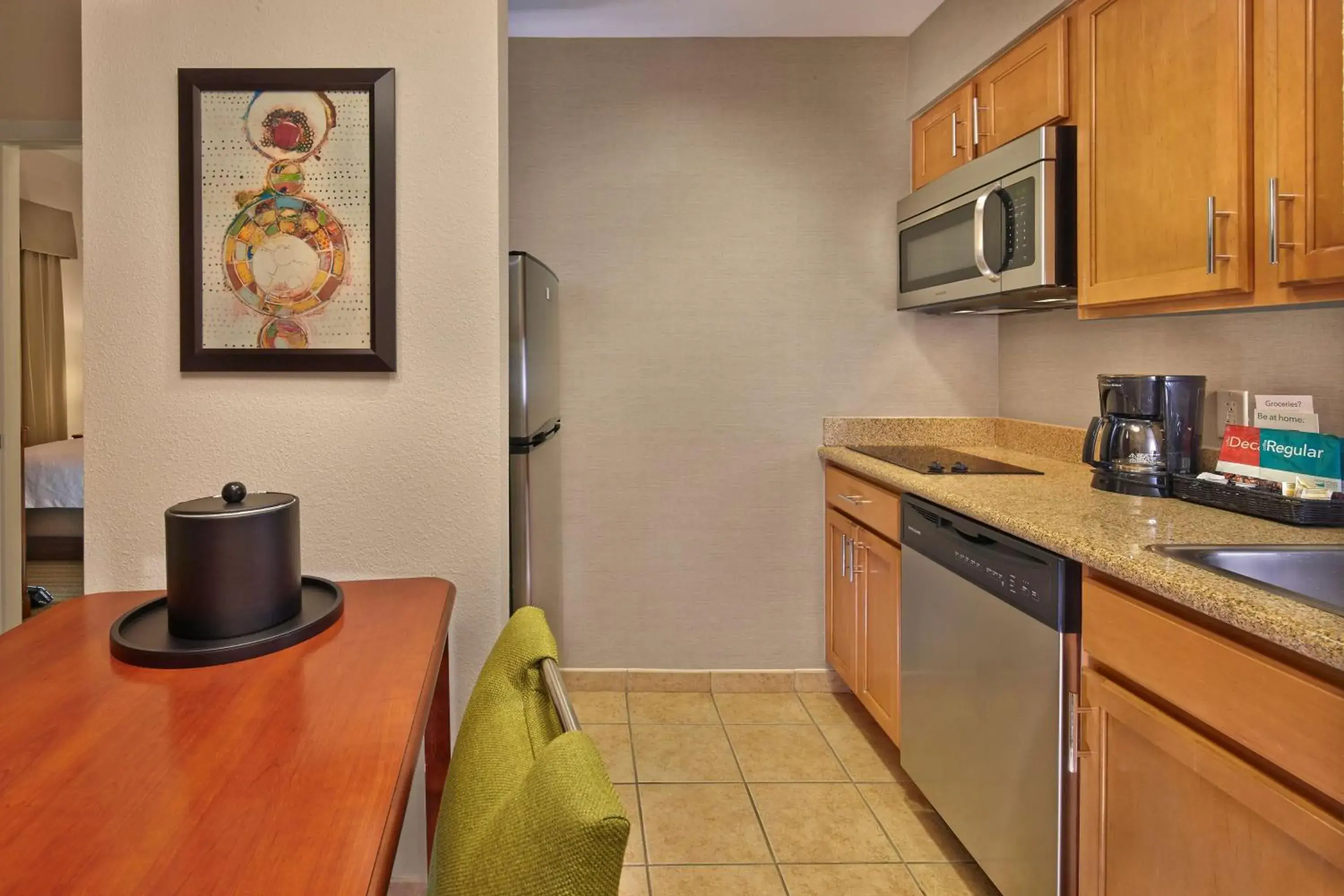 Kitchen or kitchenette, Kitchen/Kitchenette in Homewood Suites by Hilton Daytona Beach Speedway-Airport