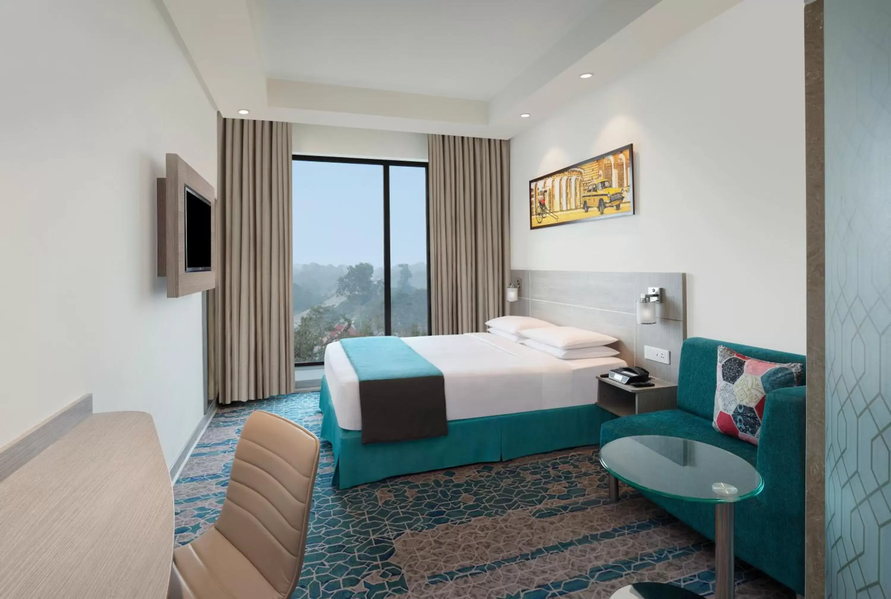 Seating area, Bed in Holiday Inn Express Kolkata Airport by IHG Seating area, Bed in Holiday Inn Express Kolkata Airport by IHG