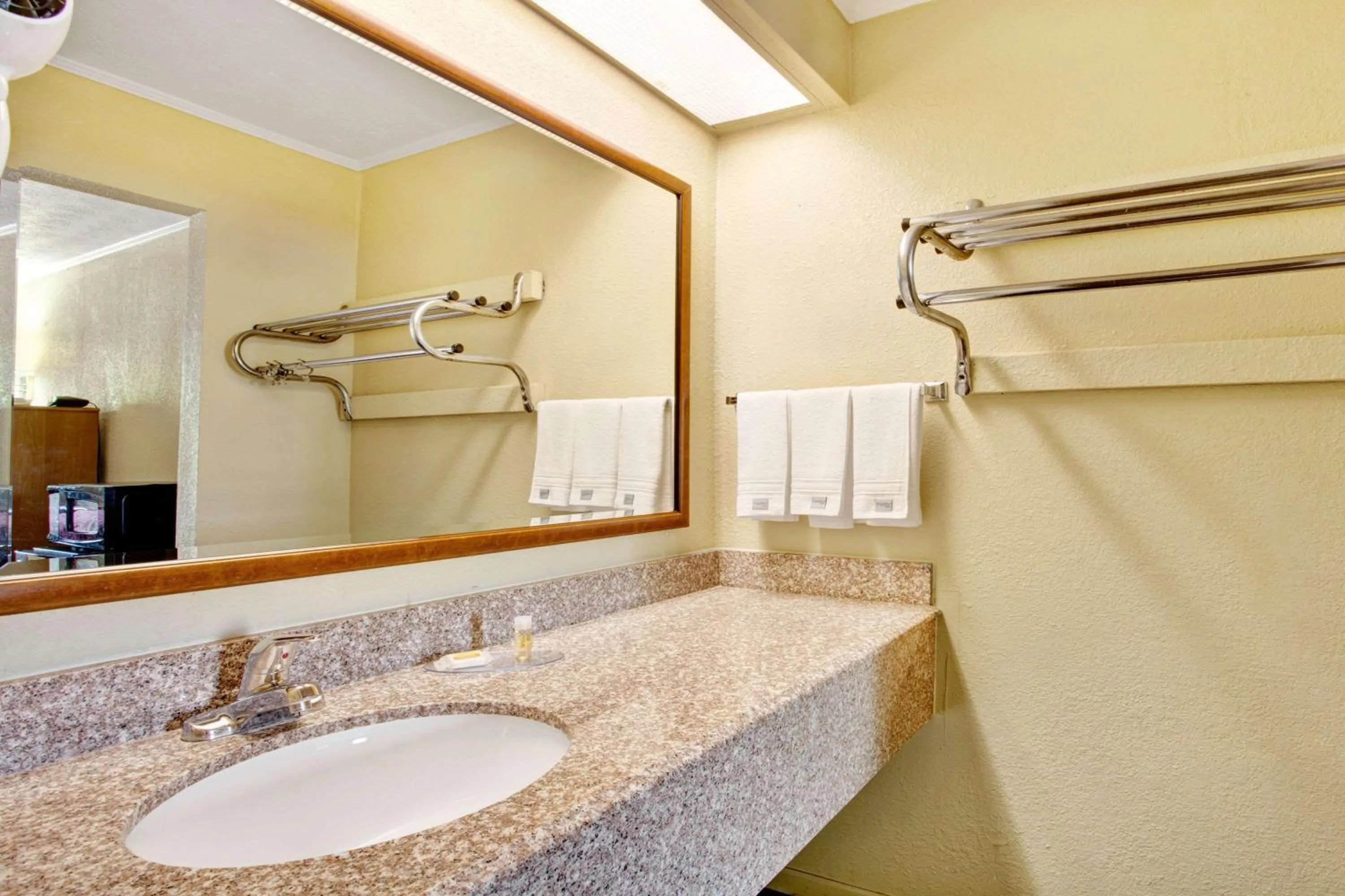 Bathroom in Days Inn by Wyndham Knoxville West