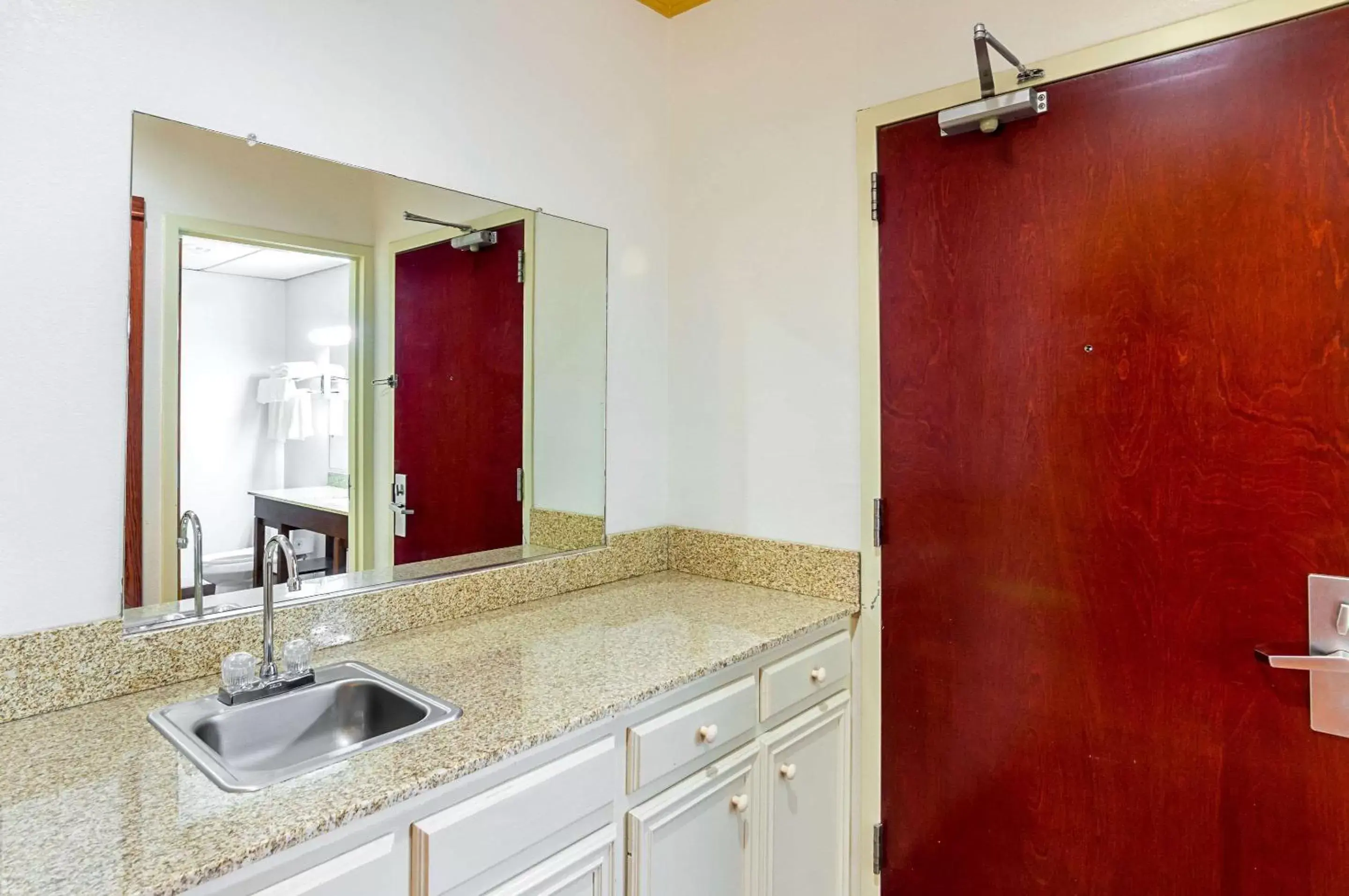 Bedroom in Quality Suites Bedroom in Quality Suites