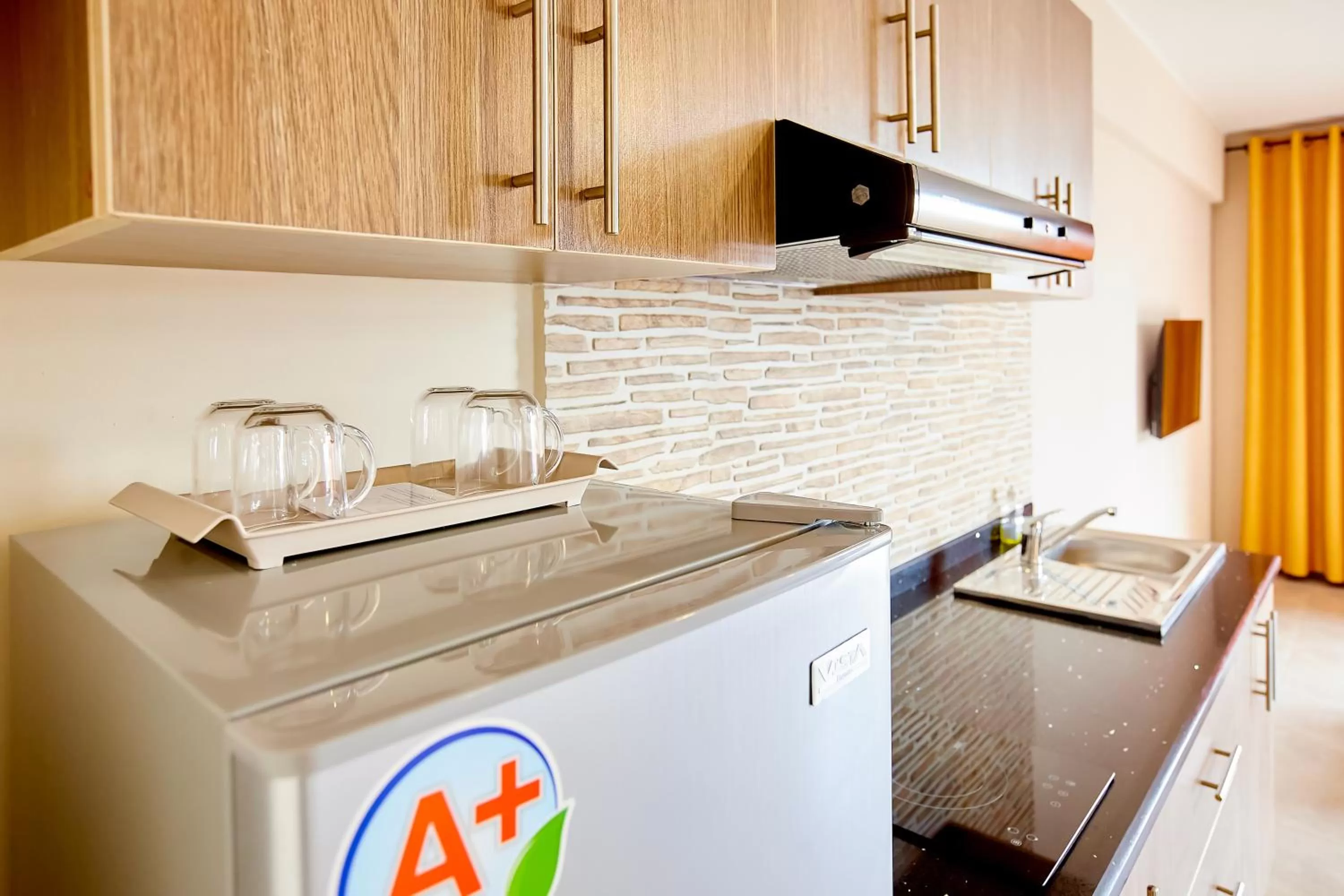 Kitchen or kitchenette in La Pergola - Appartement Hôtel