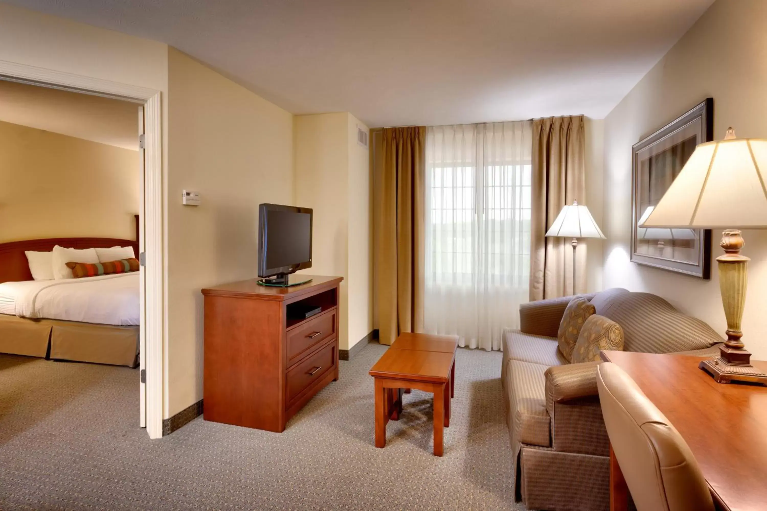Photo of the whole room, TV/Entertainment Center in Staybridge Suites Omaha 80th and Dodge, an IHG Hotel