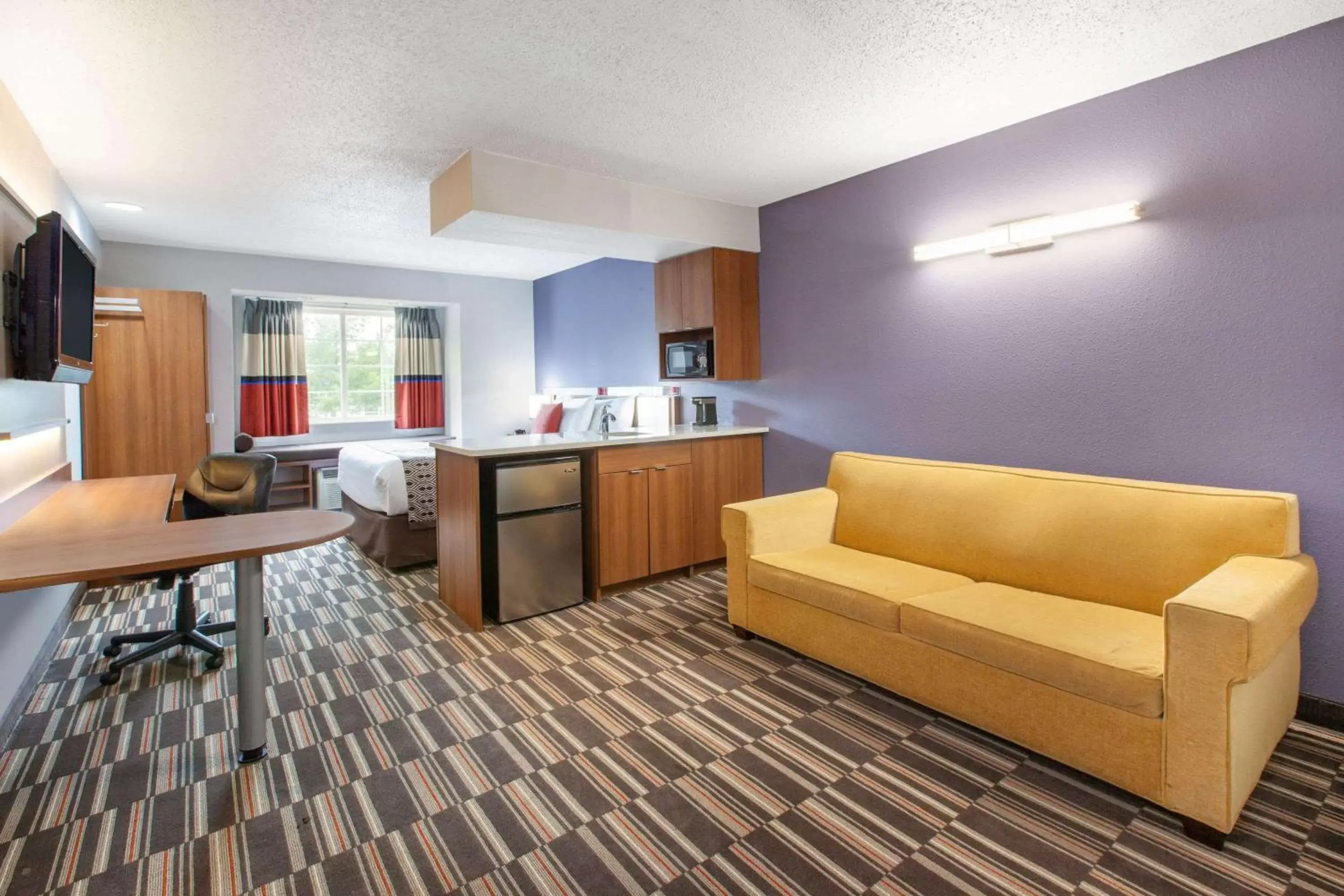 Photo of the whole room, Seating Area in Microtel Inn & Suites by Wyndham Pittsburgh Airport