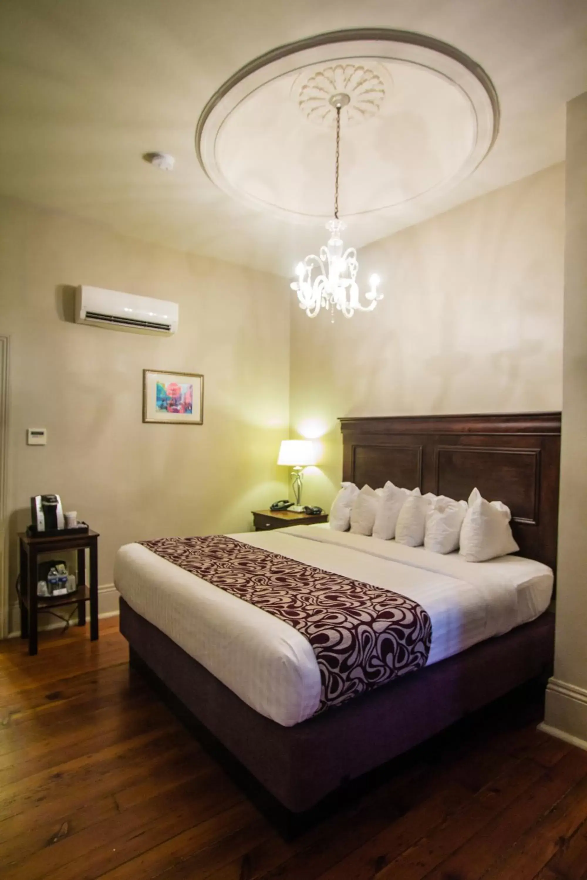 Bed in Inn on St. Peter, a French Quarter Guest Houses Property