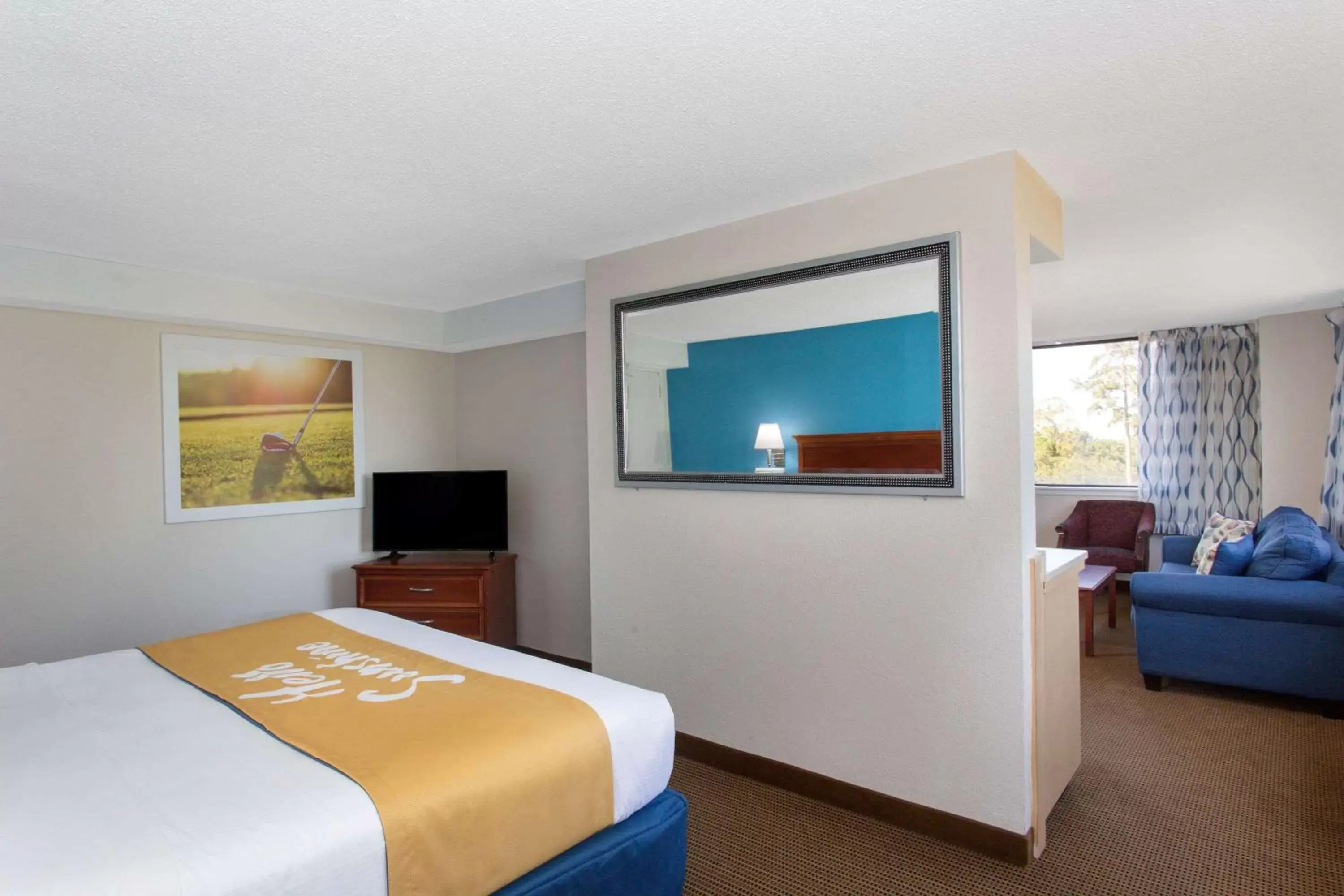Photo of the whole room, Bed in Days Inn & Suites by Wyndham Tallahassee Conf Center I-10