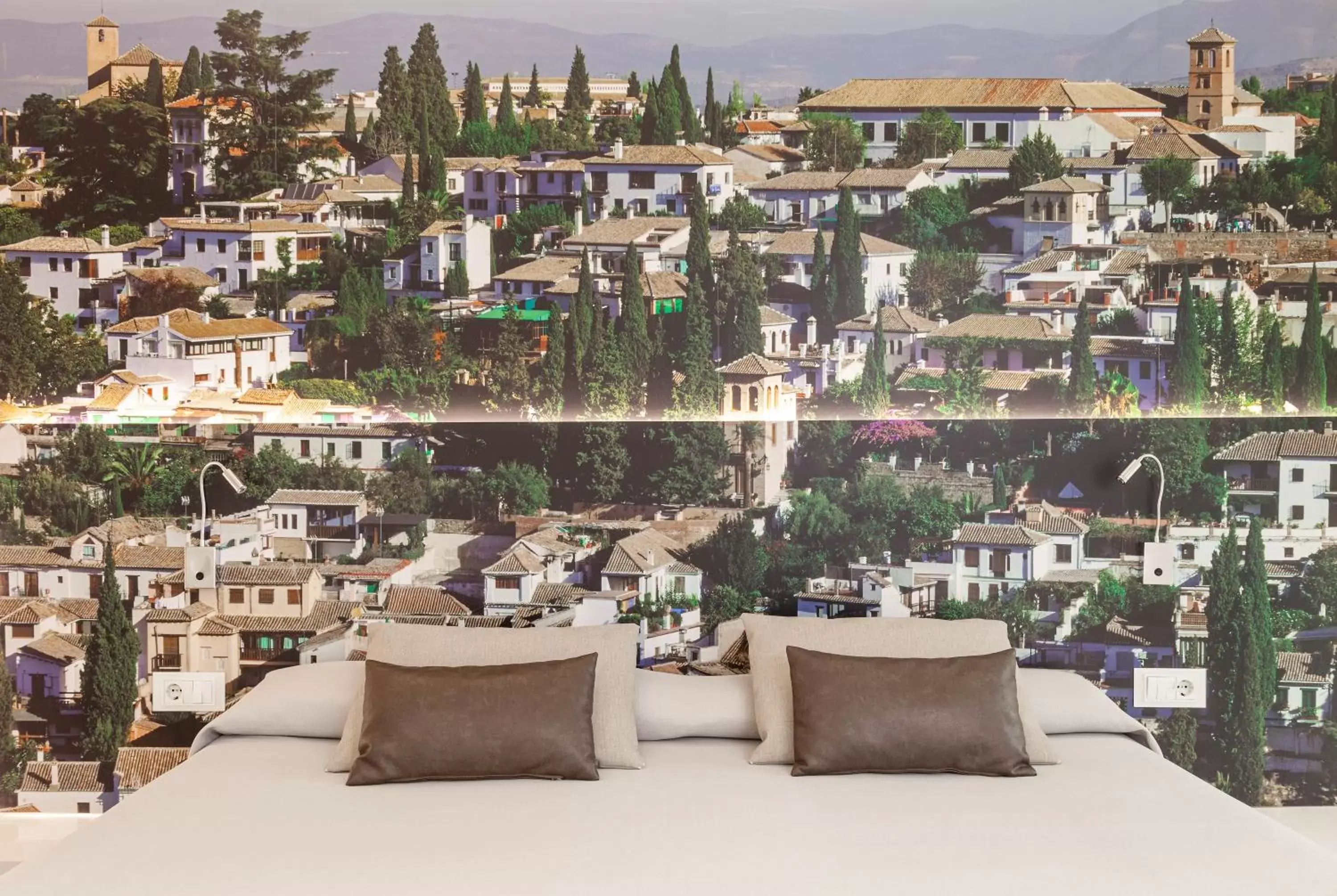 Bed in Hotel Macià Granada Five Senses Rooms & Suites