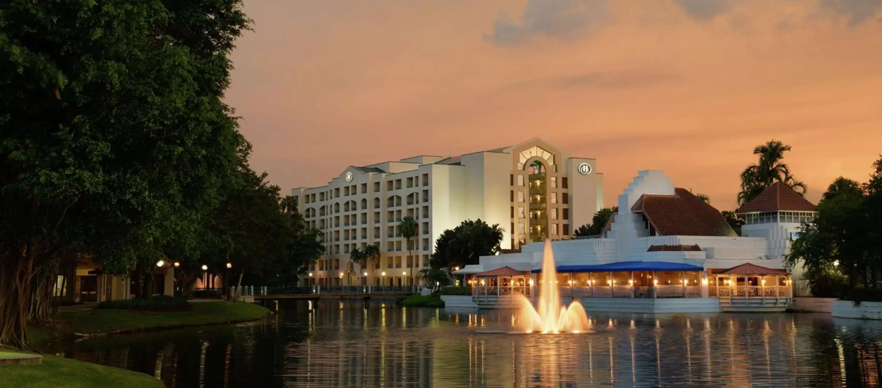 Property building, Swimming Pool in Hilton Boca Raton Suites