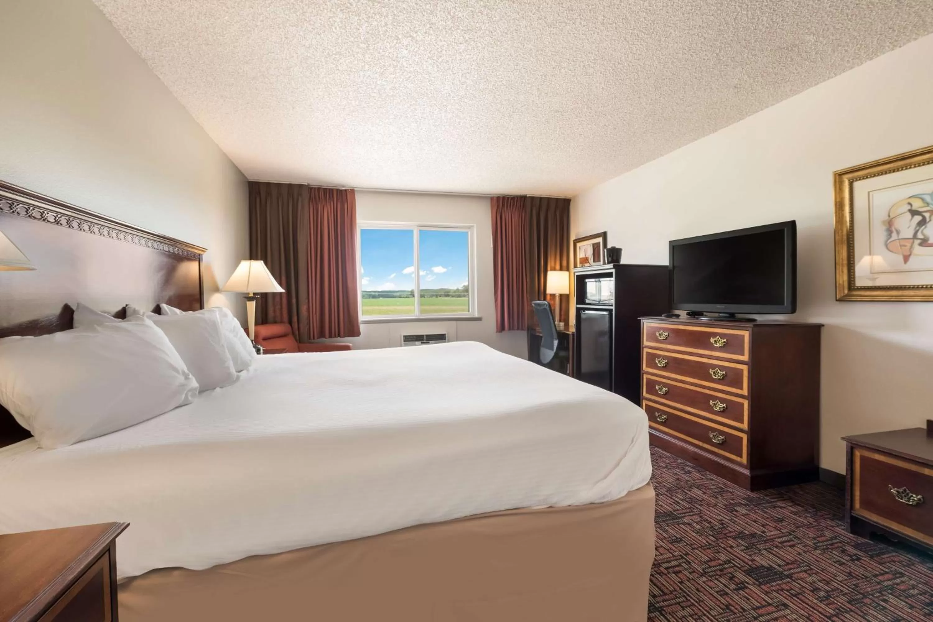 Bedroom, Bed in SureStay Hotel by Best Western Thomson