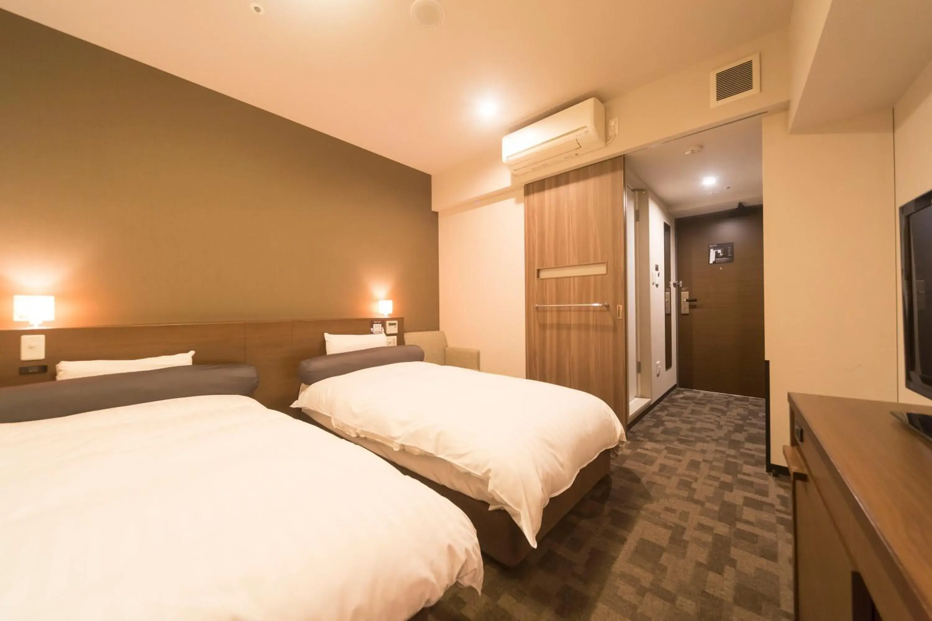 Bed in Dormy Inn Premium Shibuya-jingumae