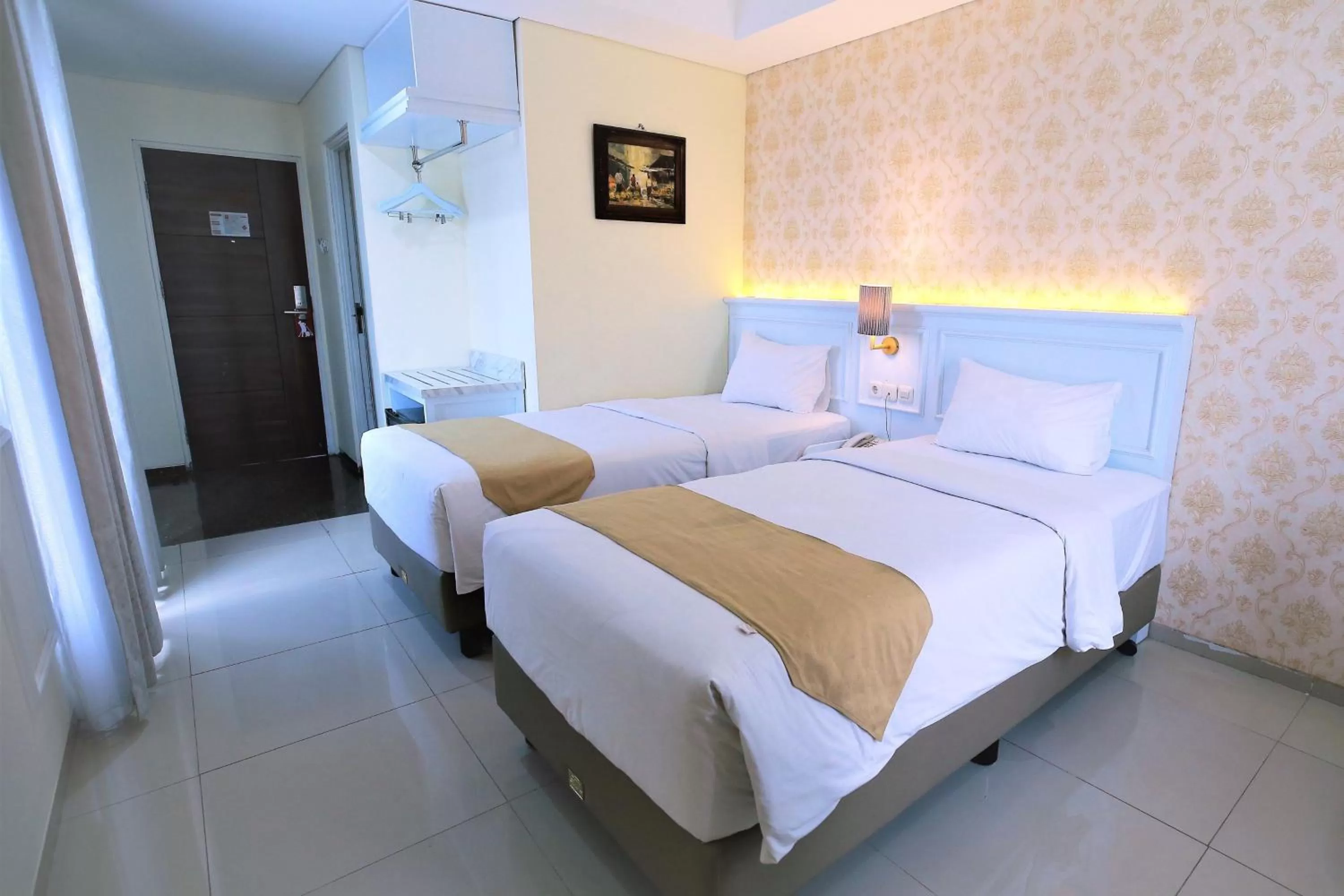 Bed in The Cube Hotel Malioboro, Azana Hotels Collection