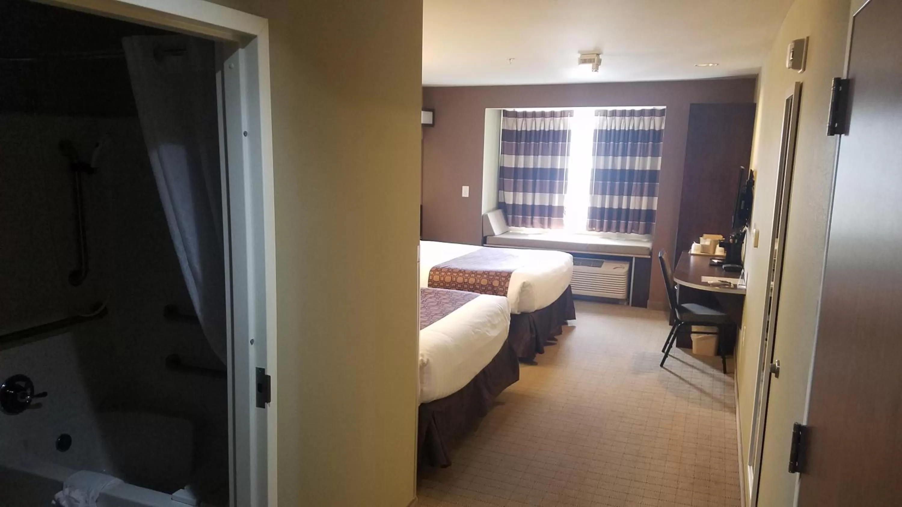 Bed in Microtel Inn & Suites by Wyndham