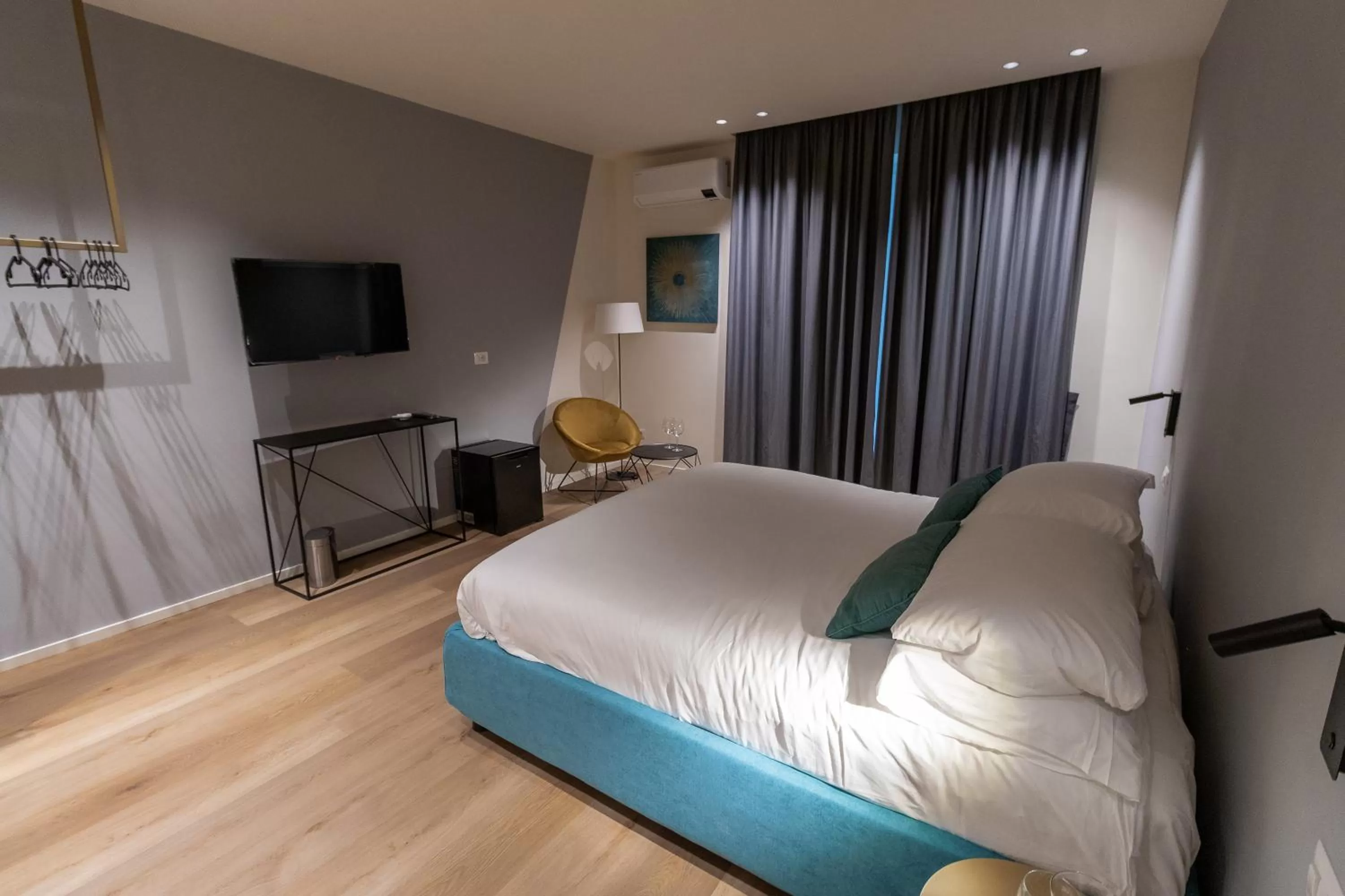 Bed, TV/Entertainment Center in Pasubio Quattro BB