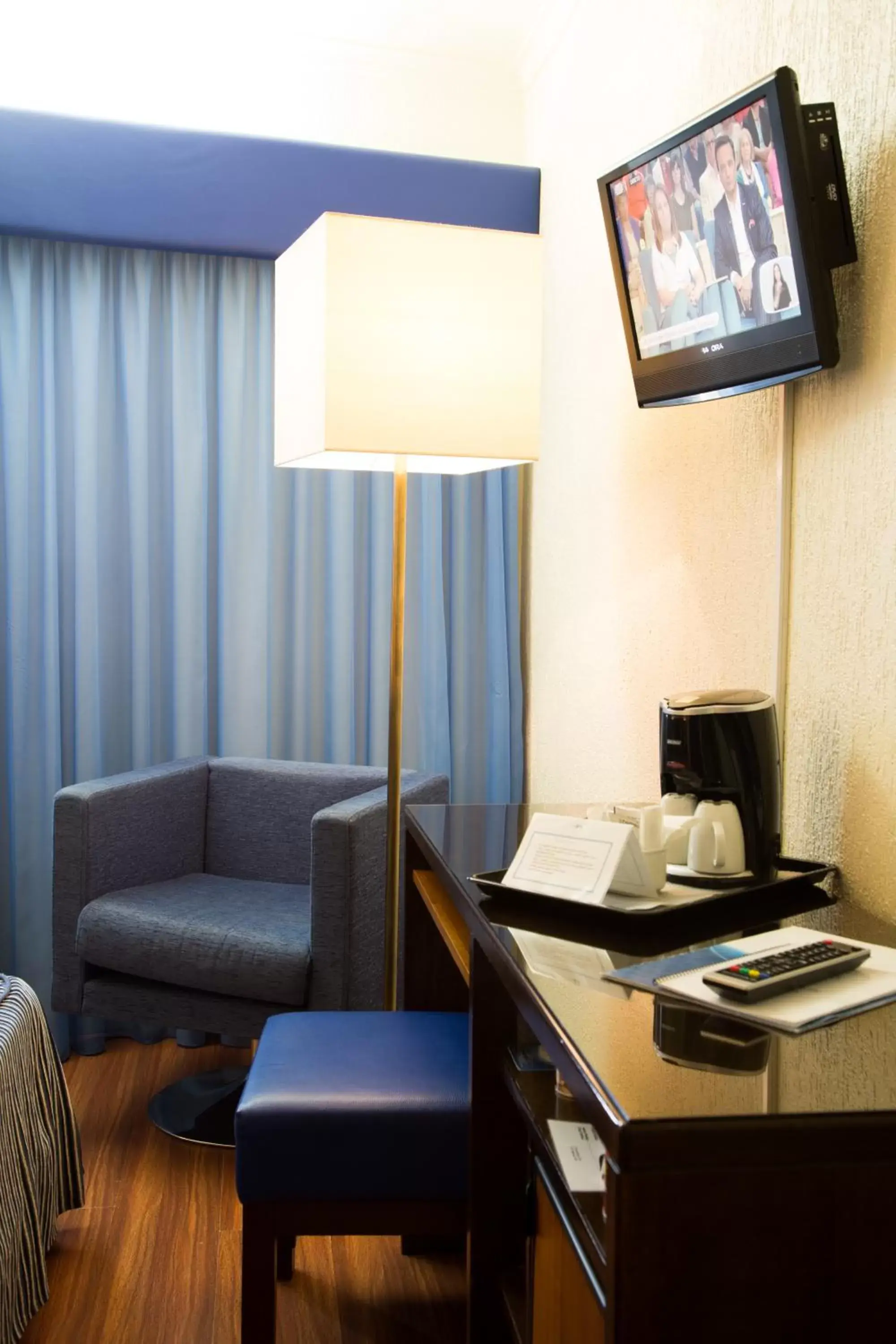TV and multimedia, TV/Entertainment Center in Hotel A.S. Lisboa