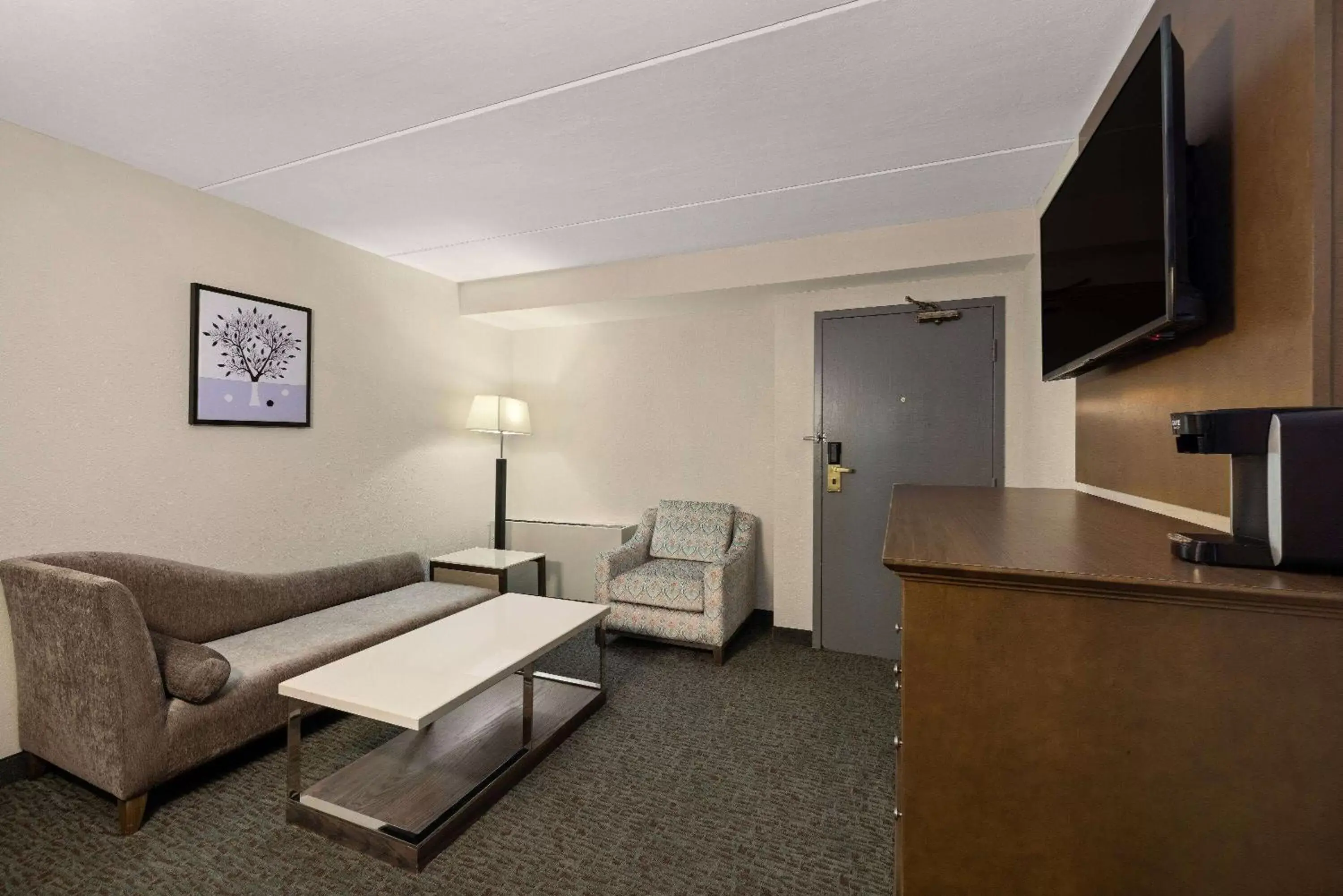 Bed, Seating Area in Baymont by Wyndham Shakopee