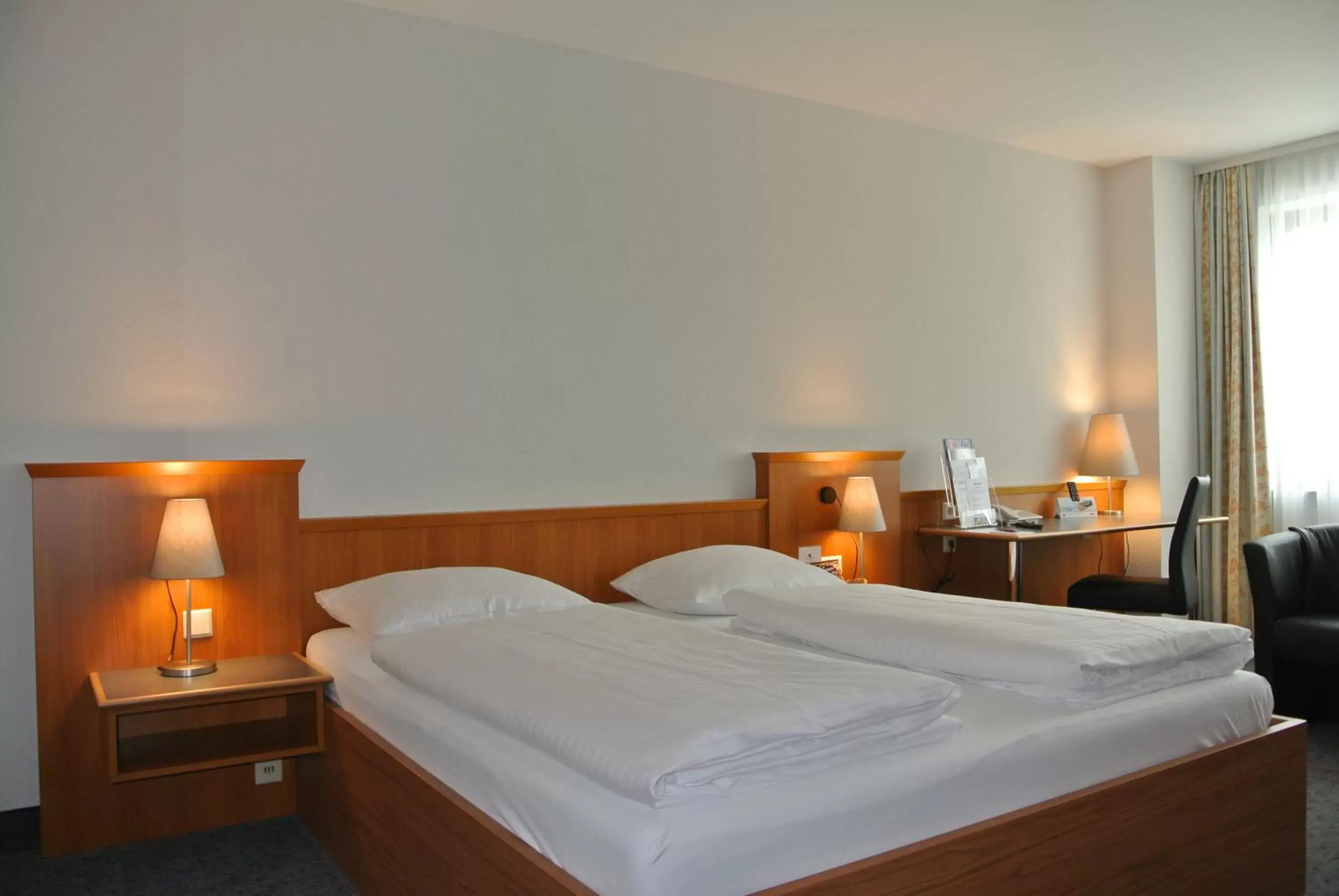 Photo of the whole room, Bed in City Hotel Suhl