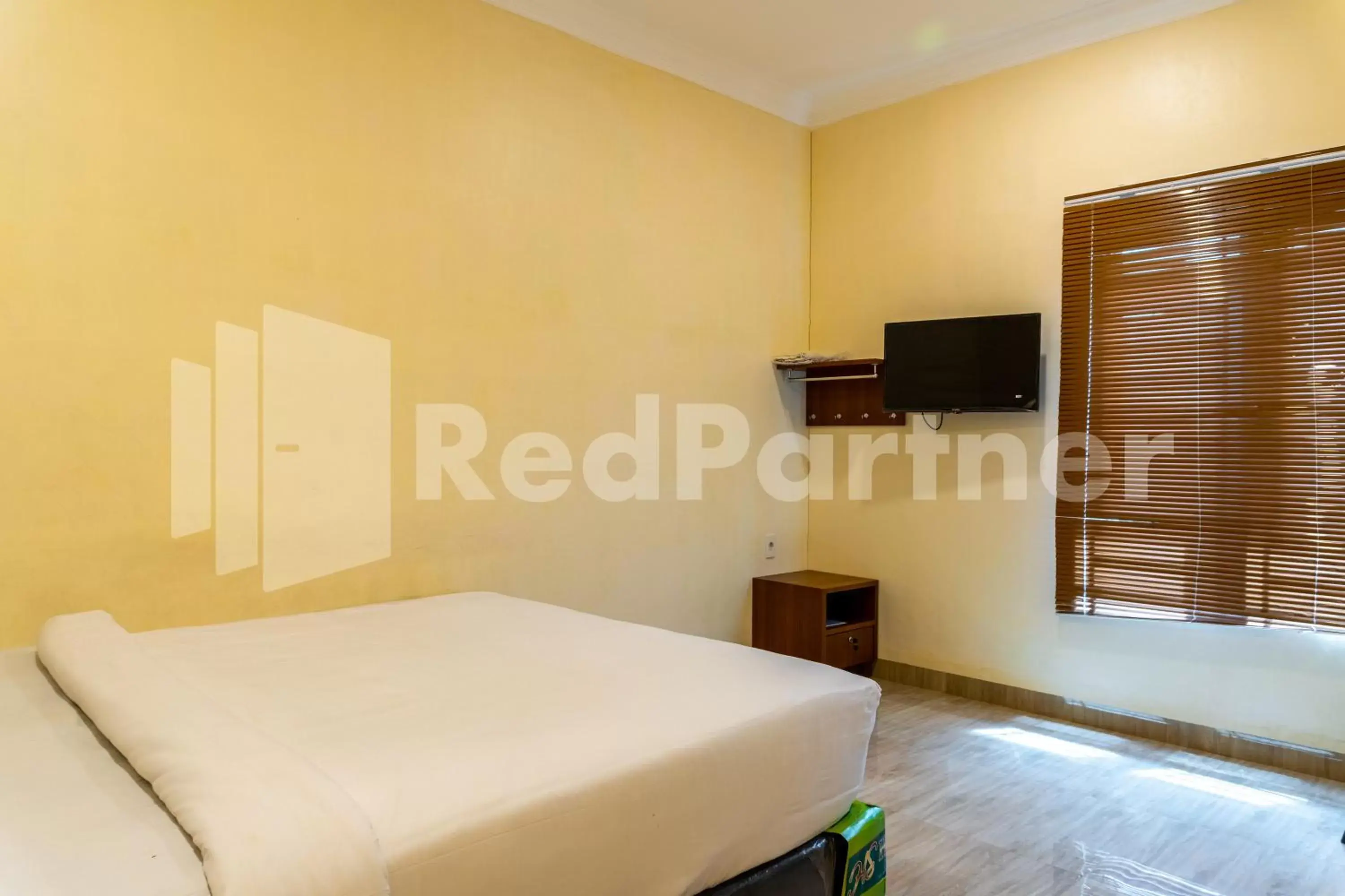 Bedroom, Bed in Adam Malik Guesthouse near Regale ICC Medan RedPartner