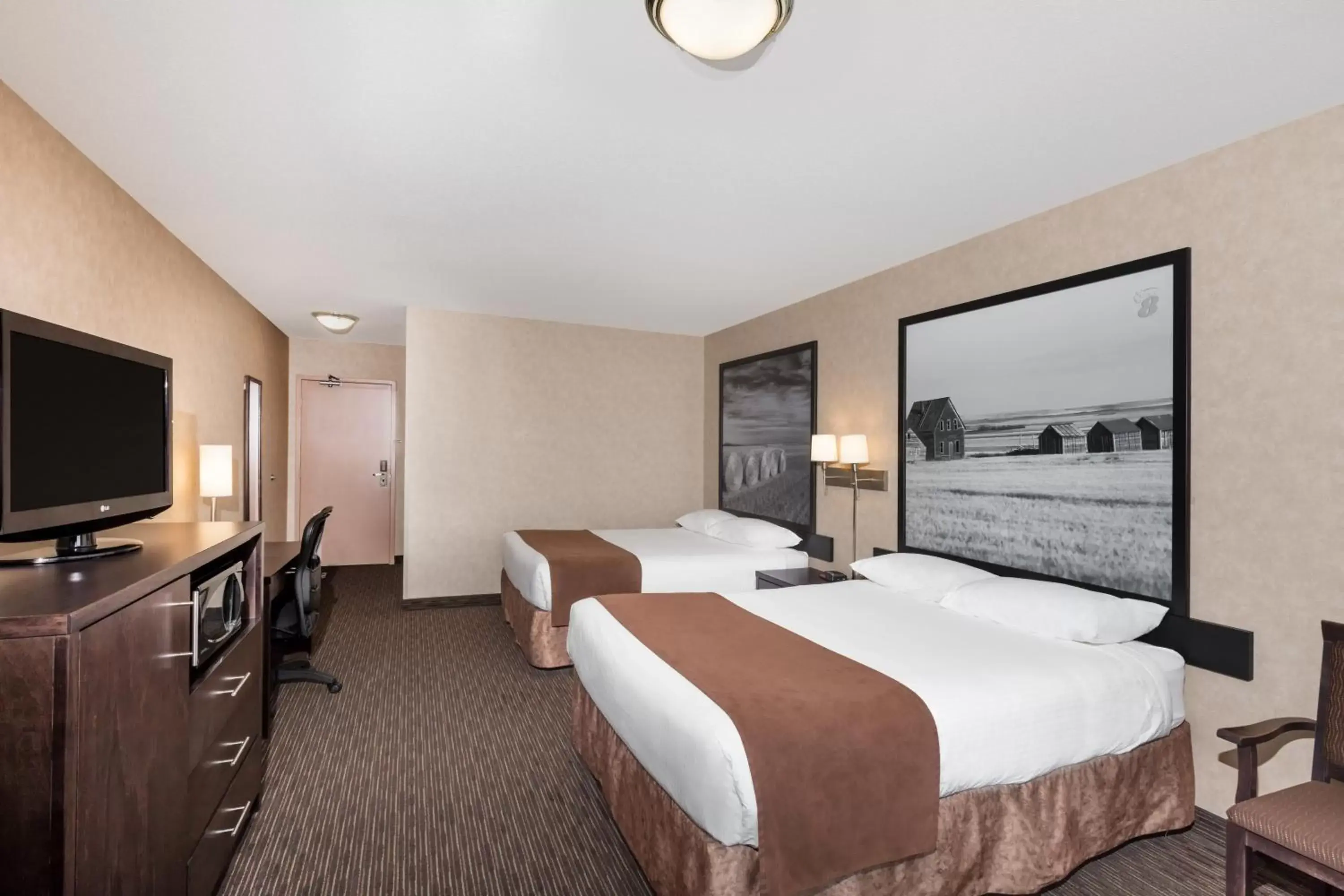 Queen Room with Two Queen Beds in Ramada by Wyndham Estevan Queen Room with Two Queen Beds in Ramada by Wyndham Estevan