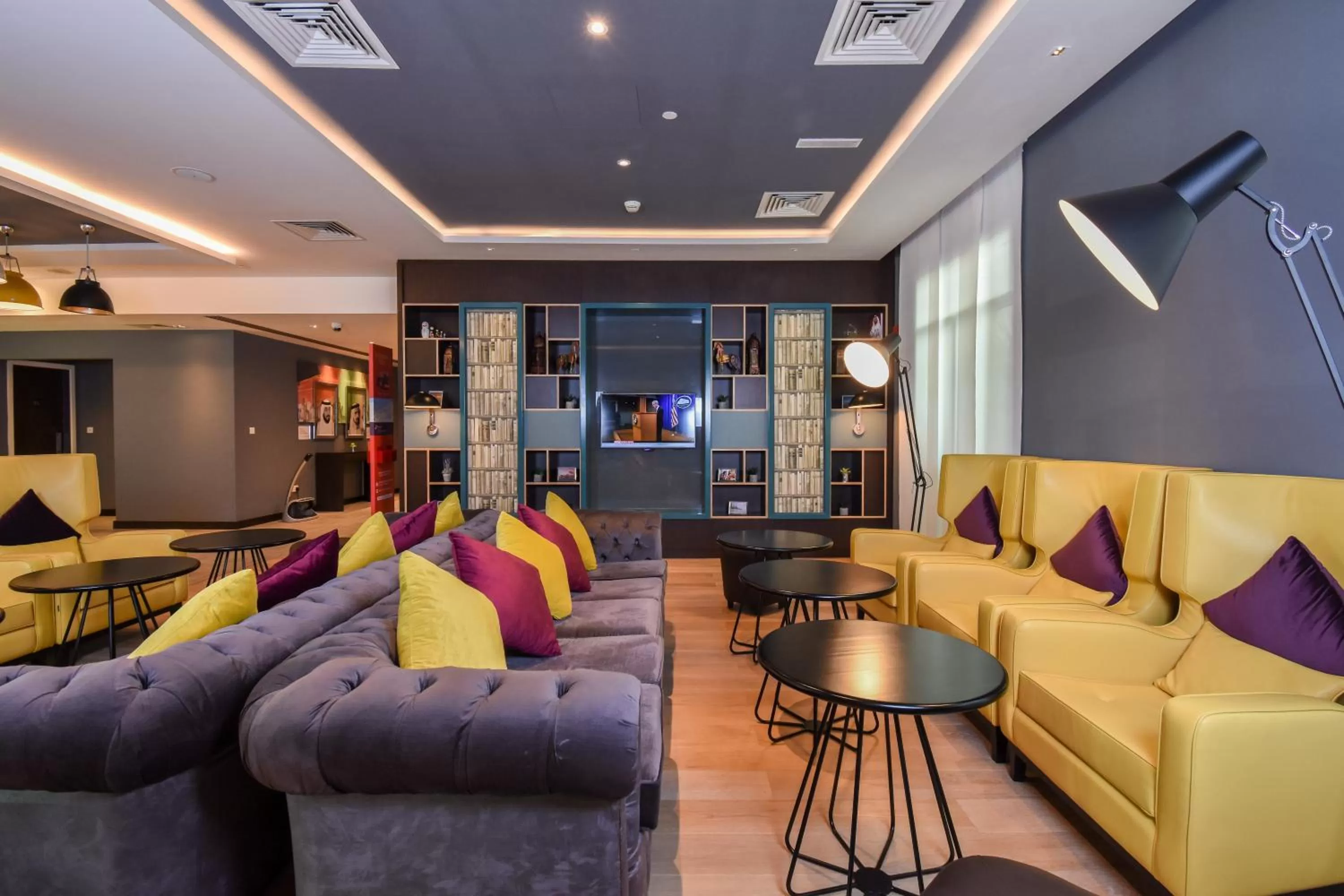 Communal lounge/ TV room in Premier Inn Dubai Investments Park - An Emirates Group Company