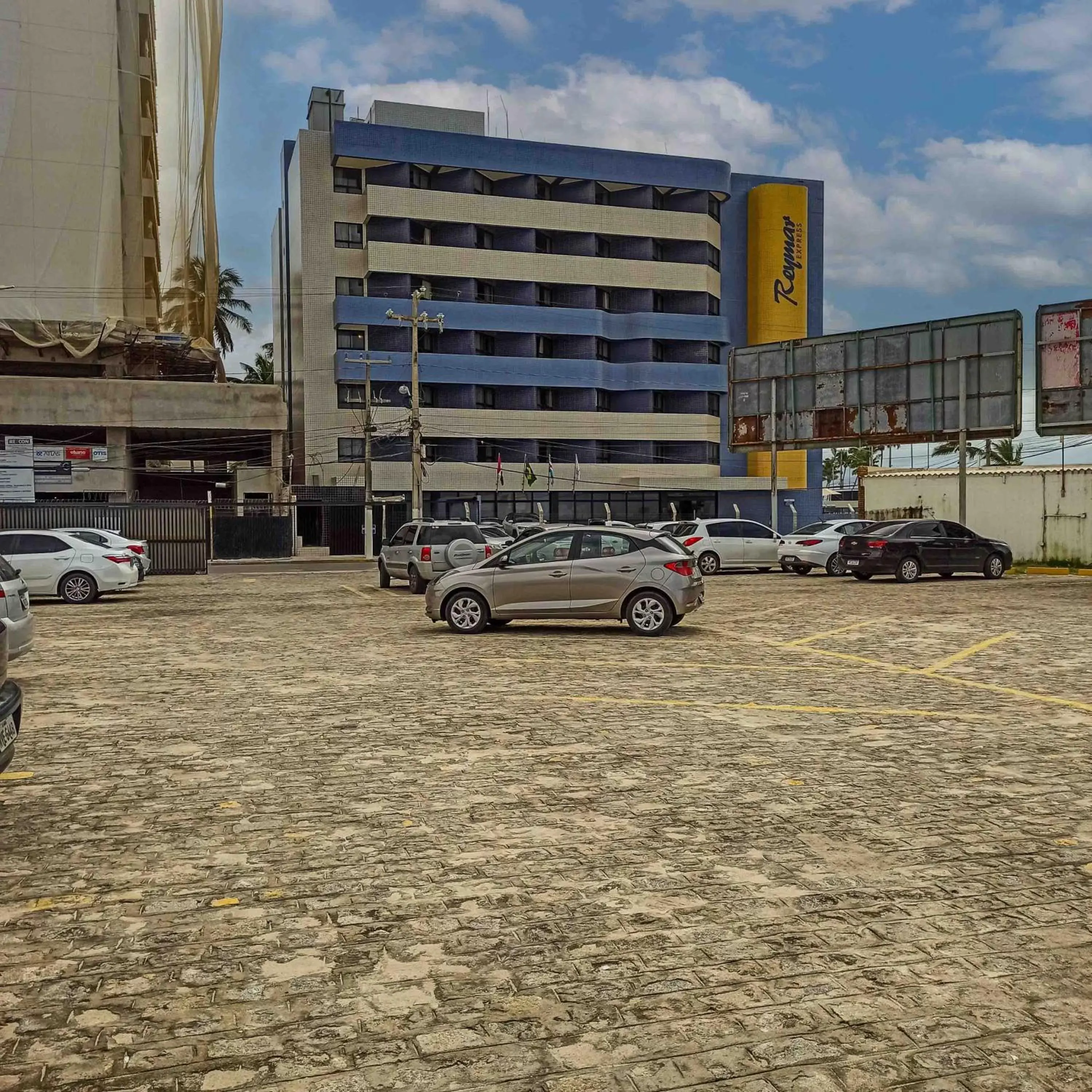 Parking, Property Building in Hotel Reymar Express