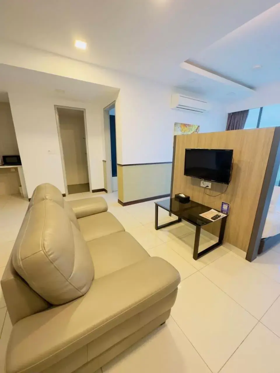 Bed, Seating Area in D'Wharf Hotel & Serviced Residence