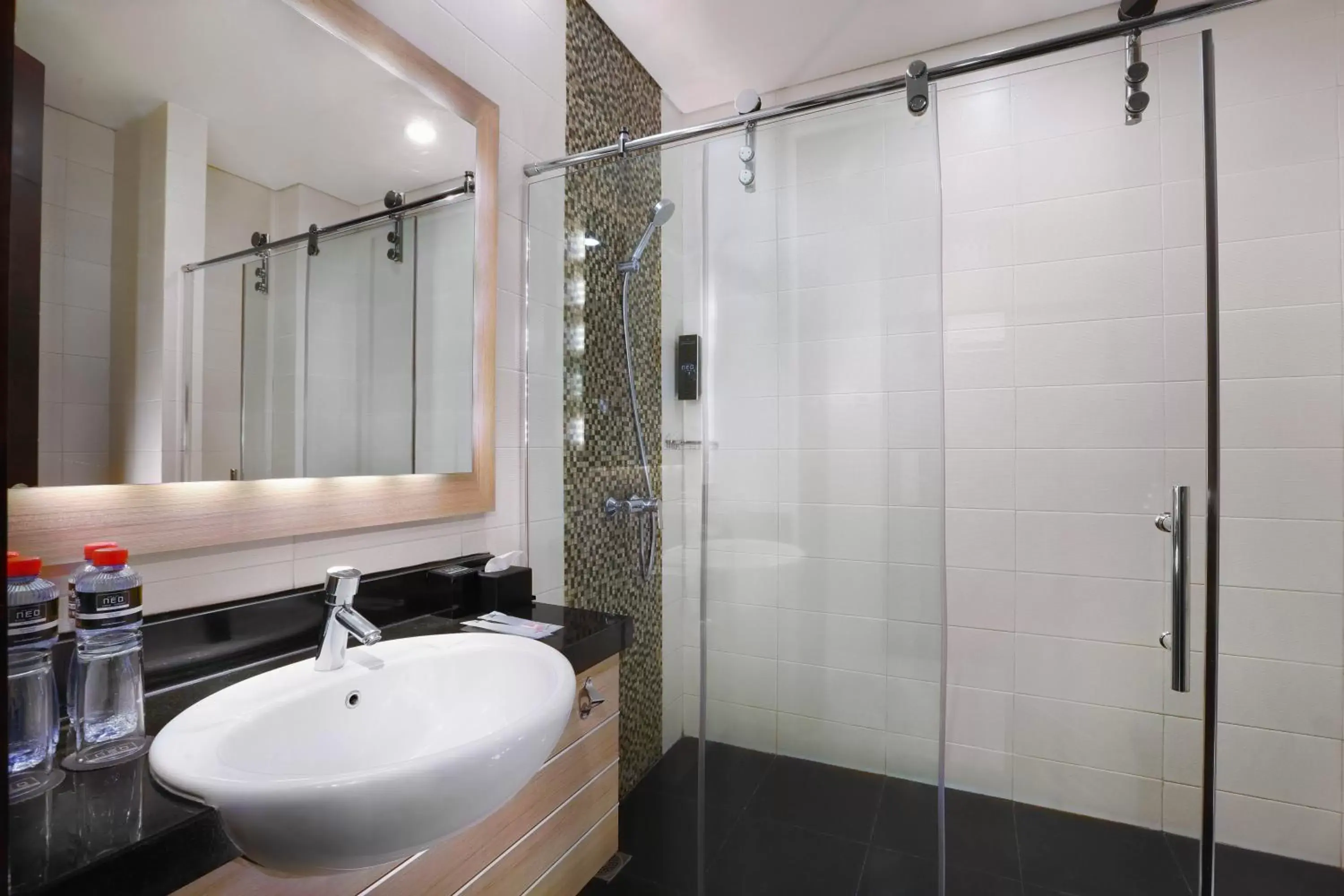 Bathroom in Hotel Neo Gubeng by ASTON