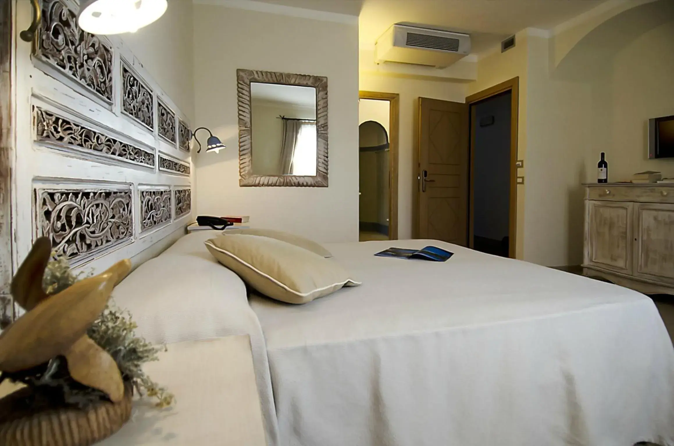 Bed in Dolce Vita Boutique Hotel