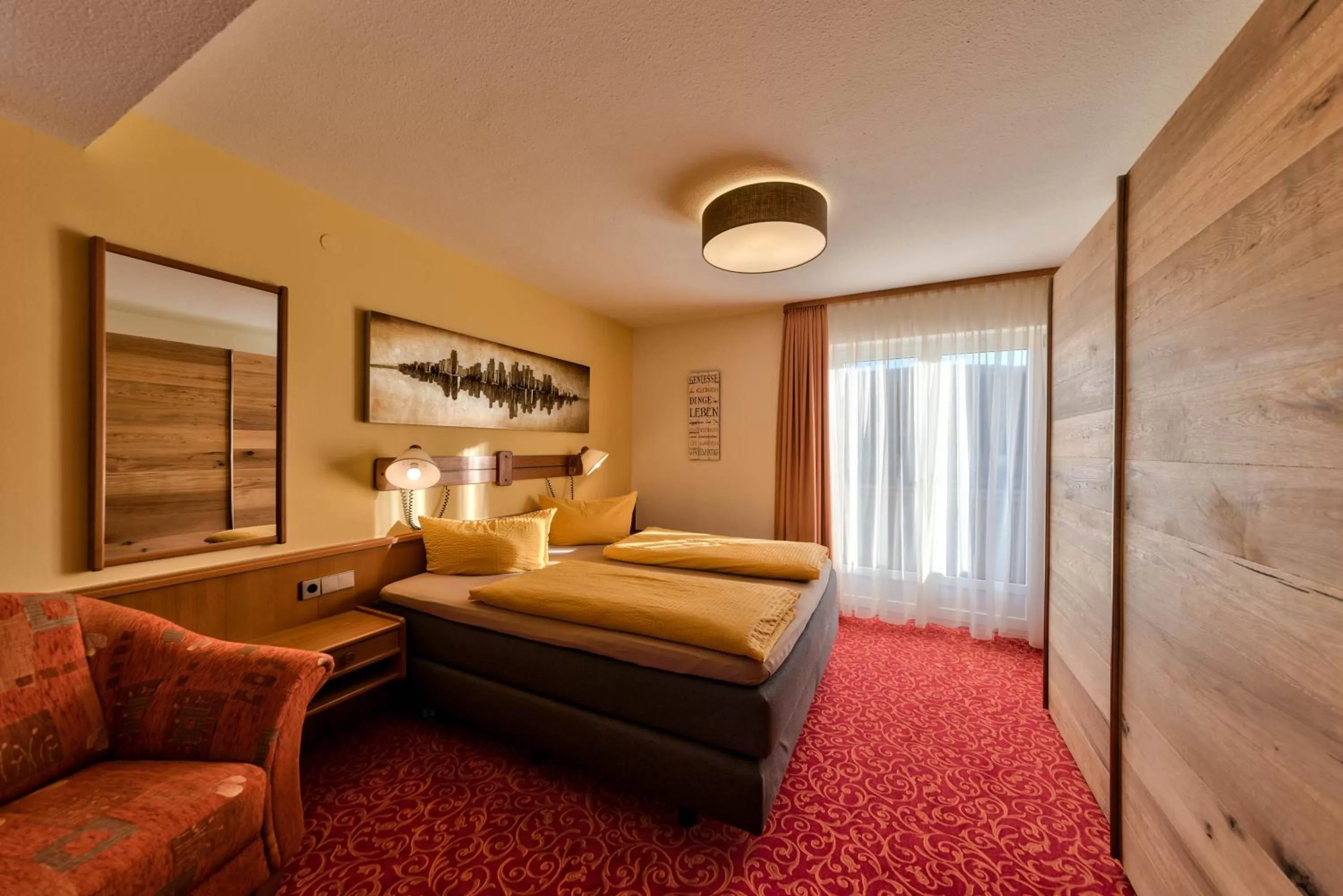 Photo of the whole room, Bed in Hotel Sonneneck Titisee -Adults Only-