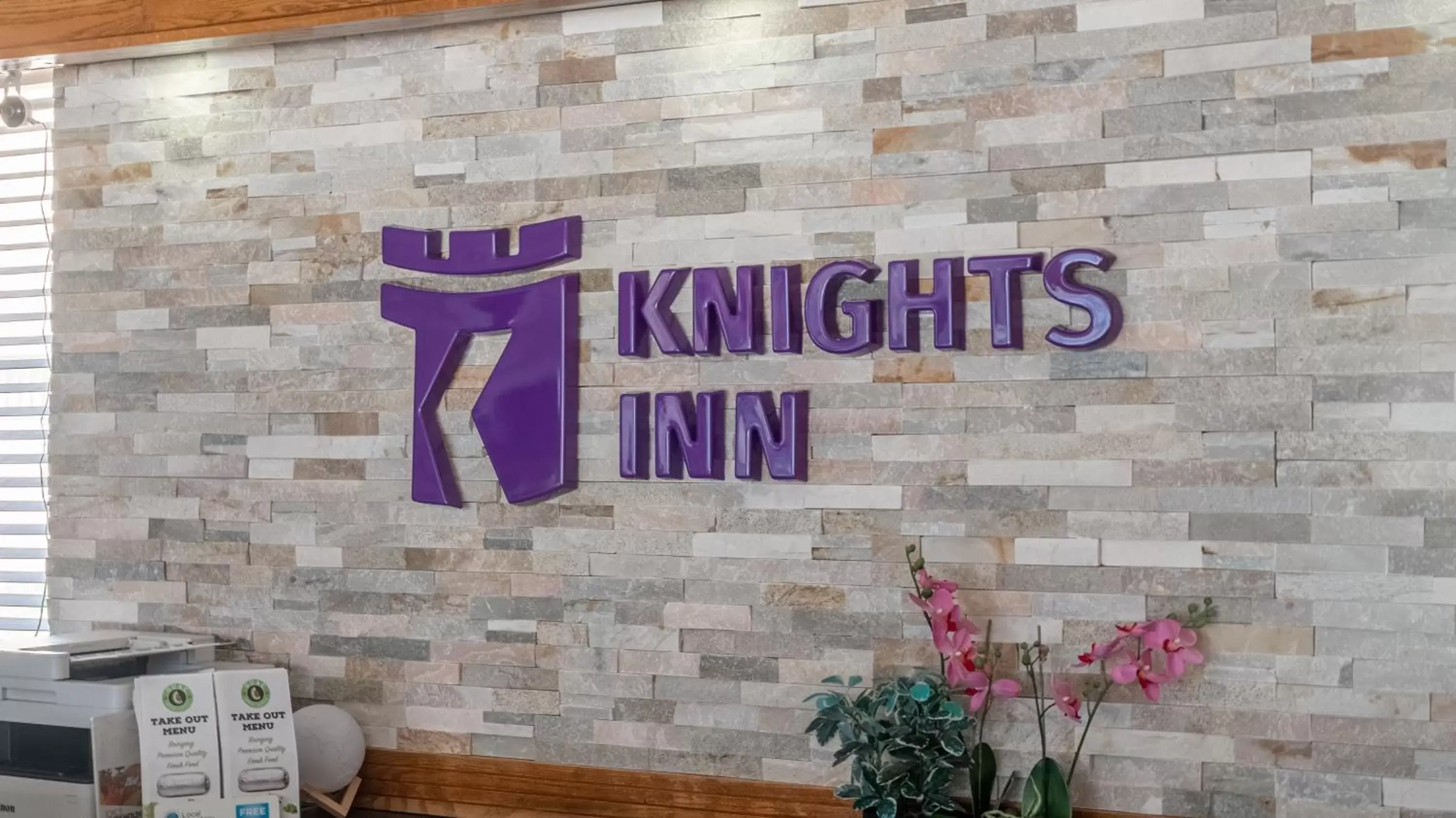 Property logo or sign in Knights Inn North Bay