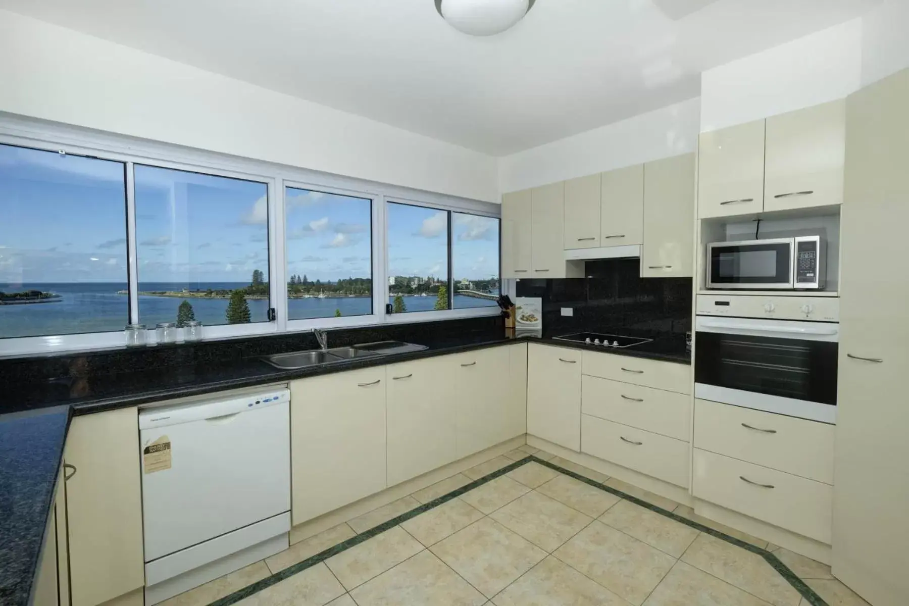 Kitchen/Kitchenette in Sunrise Luxury Apartments