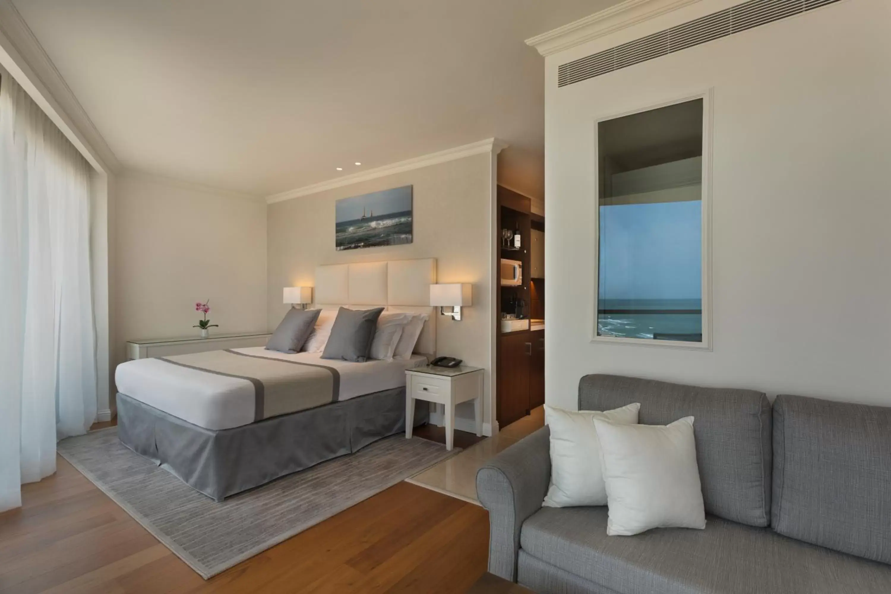 Photo of the whole room, Bed in Herbert Samuel Okeanos Suites Herzilya Photo of the whole room, Bed in Herbert Samuel Okeanos Suites Herzilya