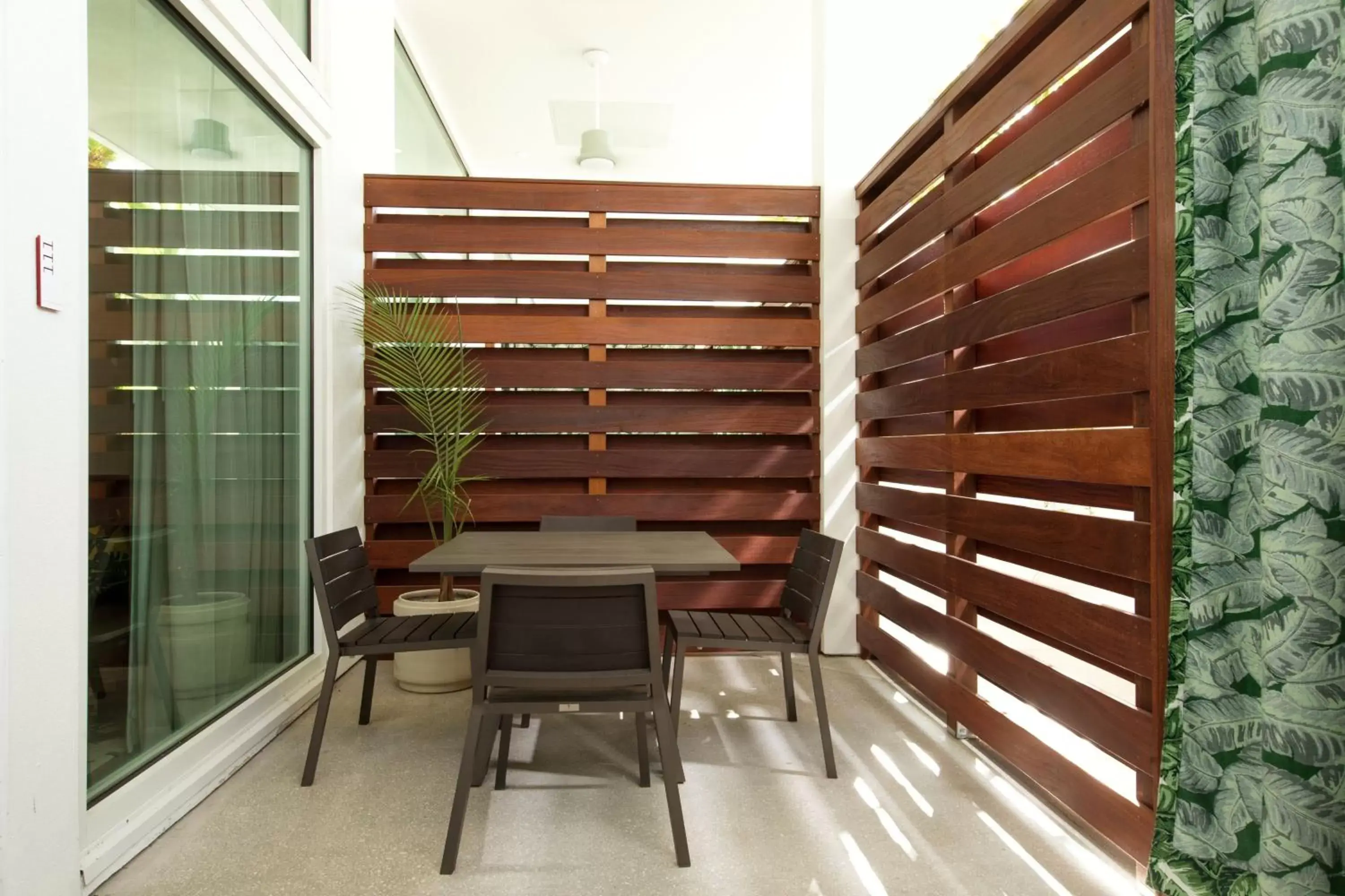 Photo of the whole room, Balcony/Terrace in The Sarasota Modern, a Tribute Portfolio Hotel