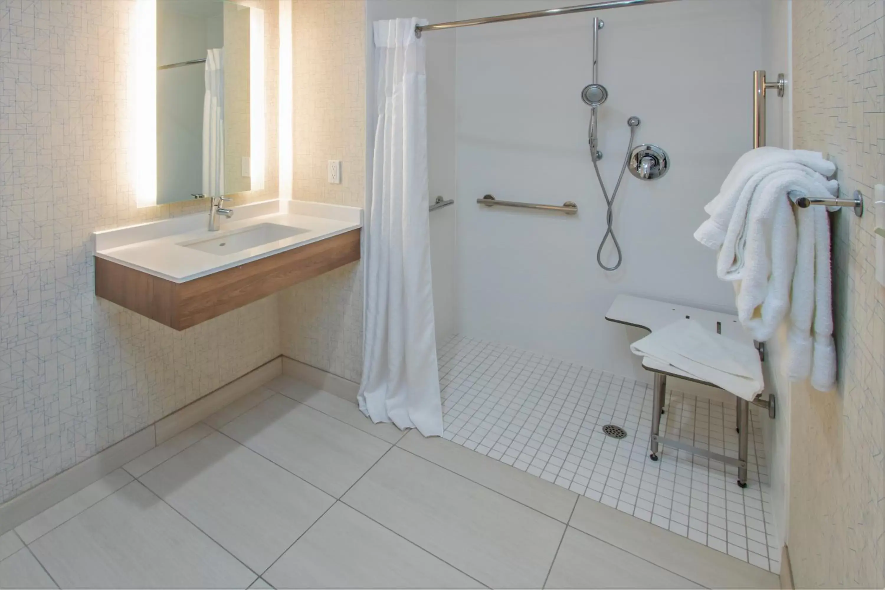Queen Room with One Queen Bed and Hearing Accessible Roll In Shower - Non-Smoking in Holiday Inn Express Hotel & Suites Roseville - Galleria Area, an IHG Hotel