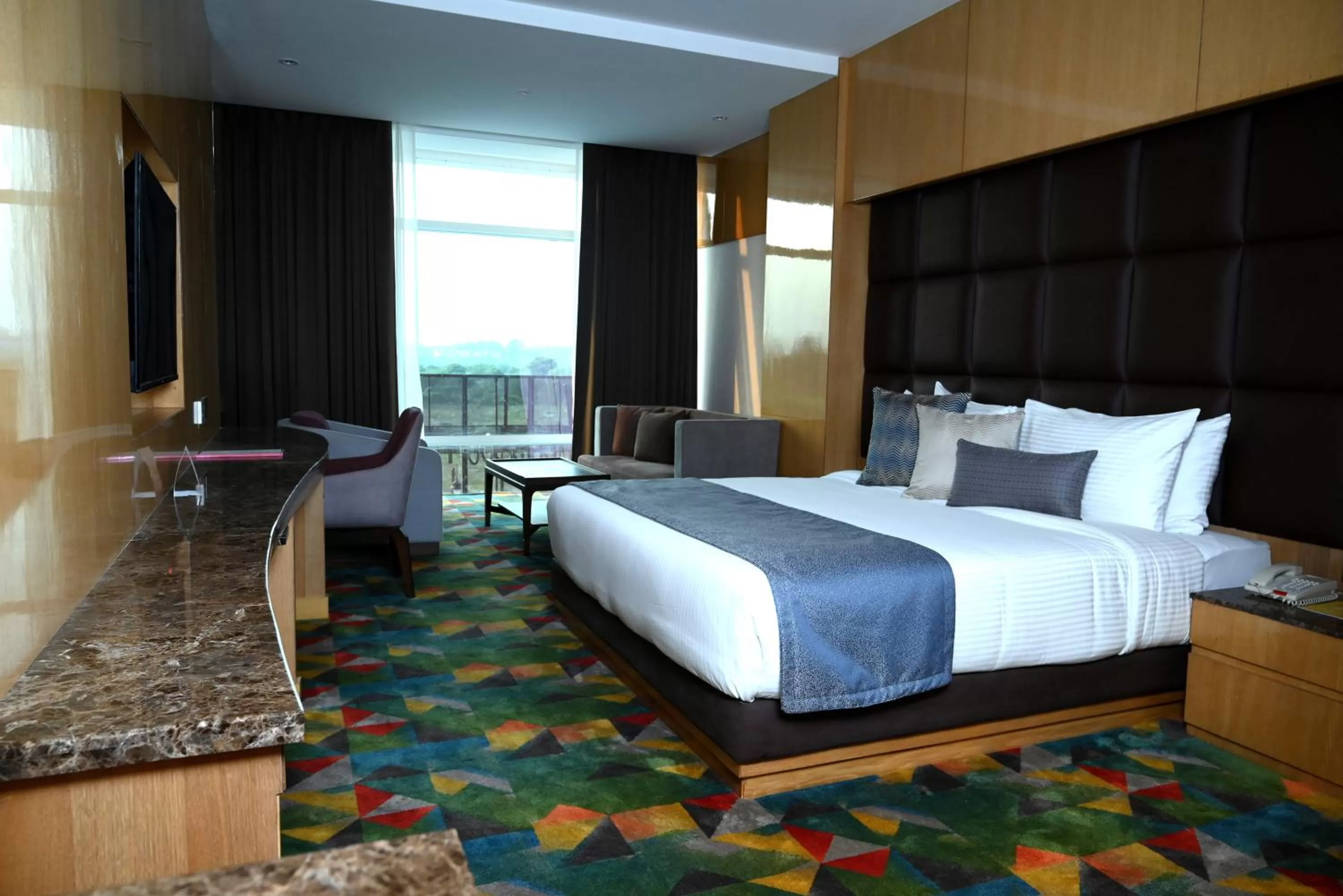 Photo of the whole room, Bed in Ramada Plaza by Wyndham Jammu Vijaypur