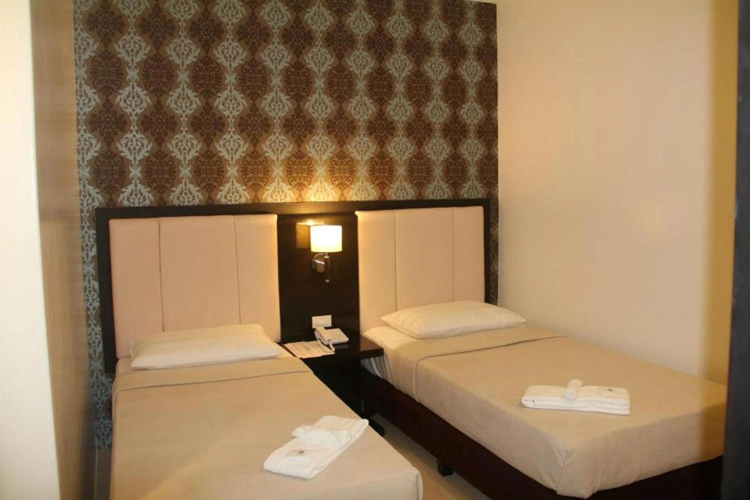 Photo of the whole room in Manhattan Suites Inn