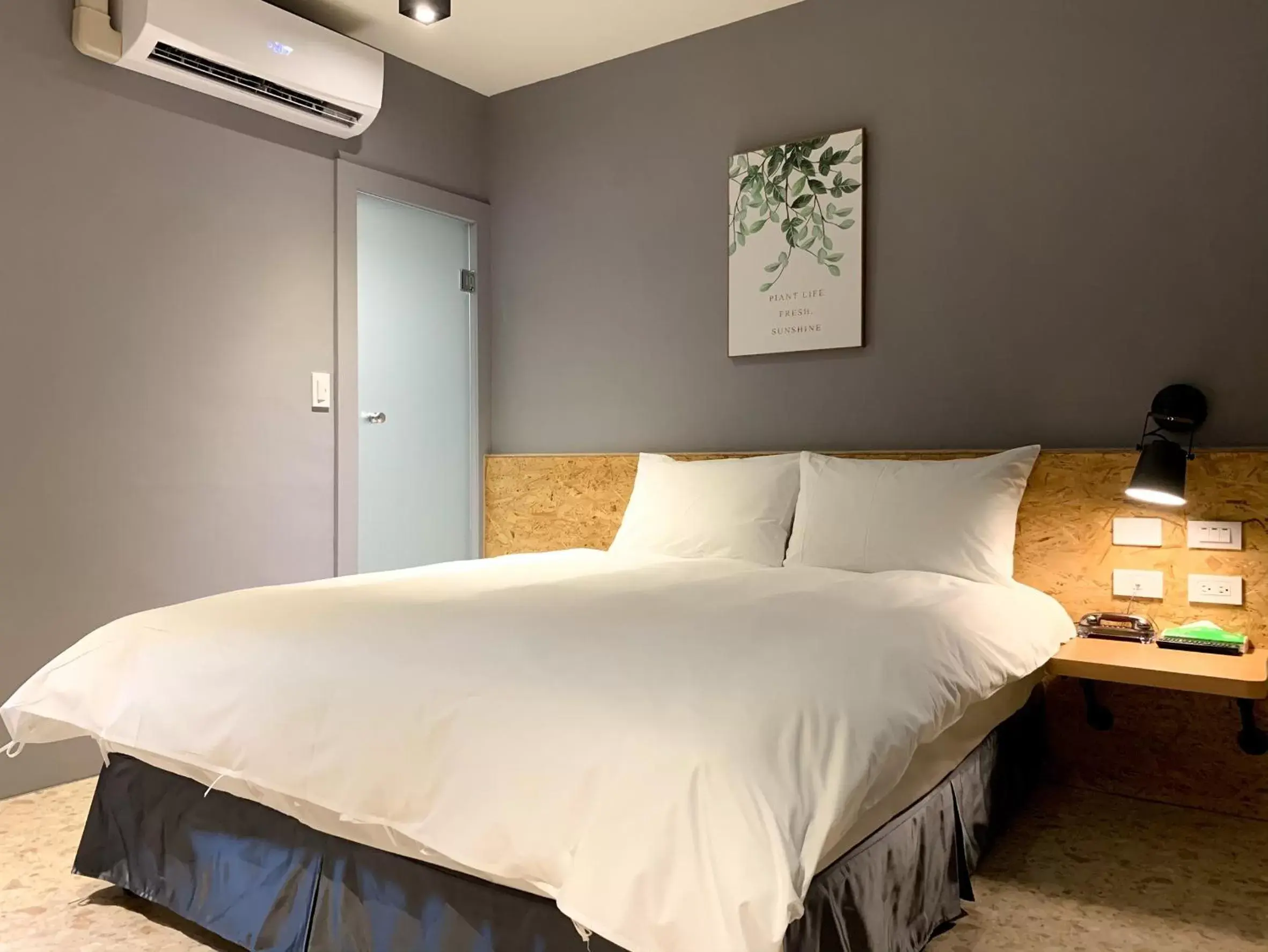 Bed in Raise Hotel Taichung