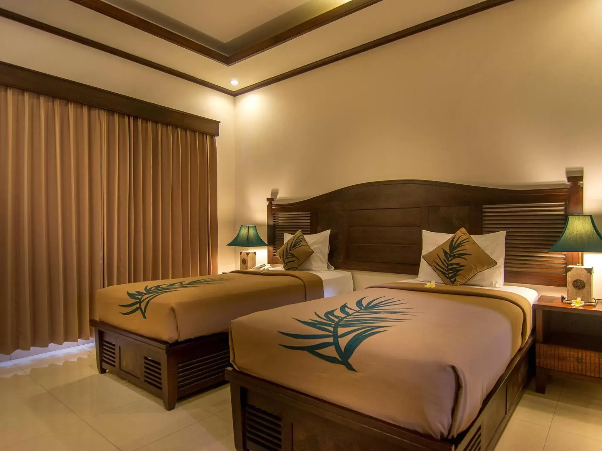 Bed in De Munut Balinese Resort