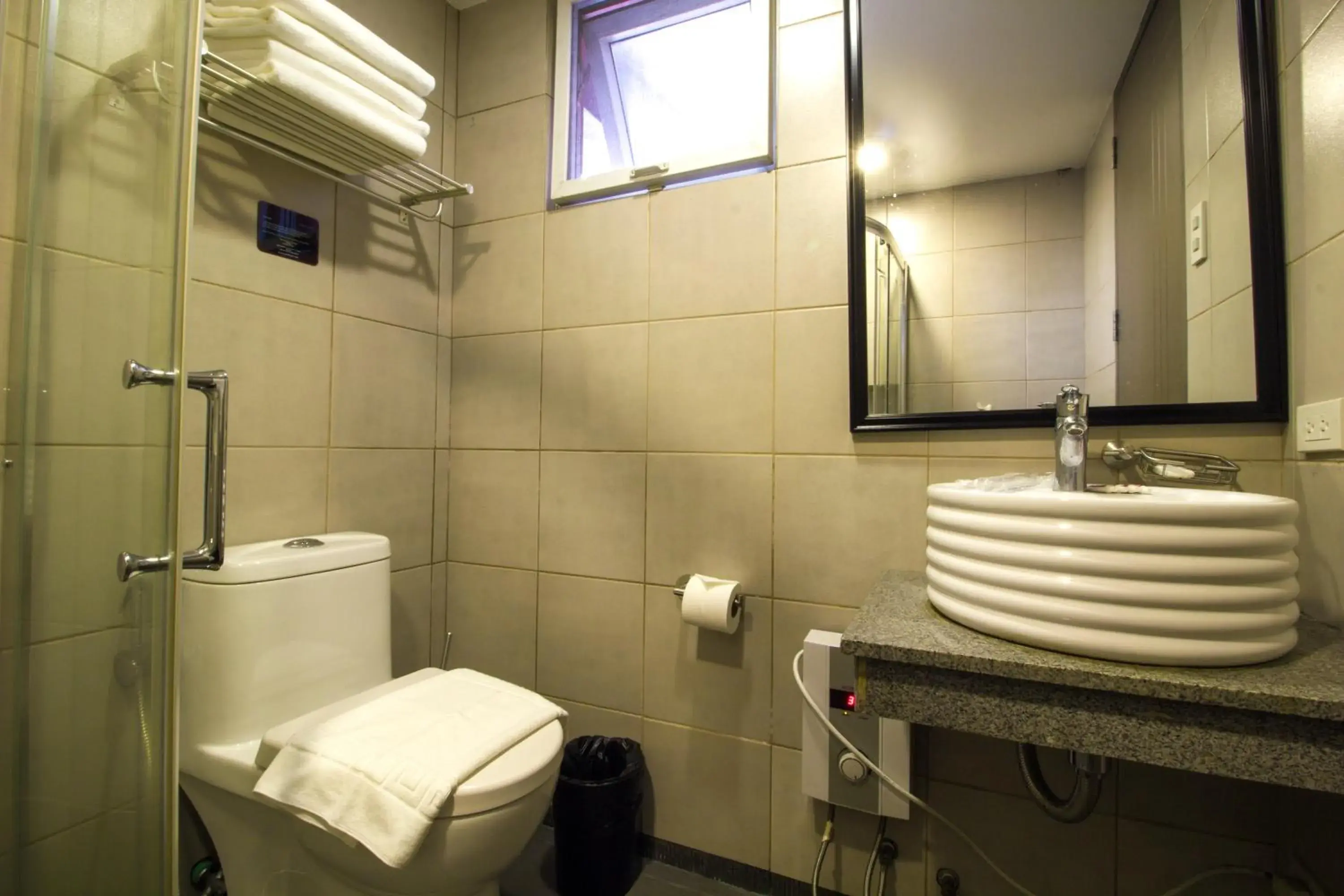 Bathroom in Jade Hotel And Suites
