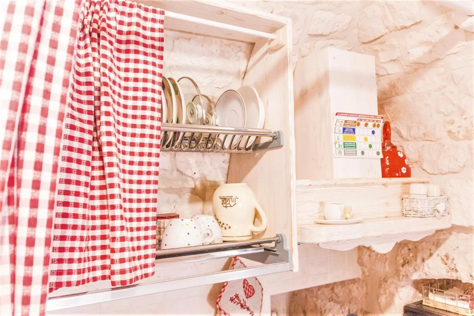 Kitchen or kitchenette in B&B Trulli Donna Isabella