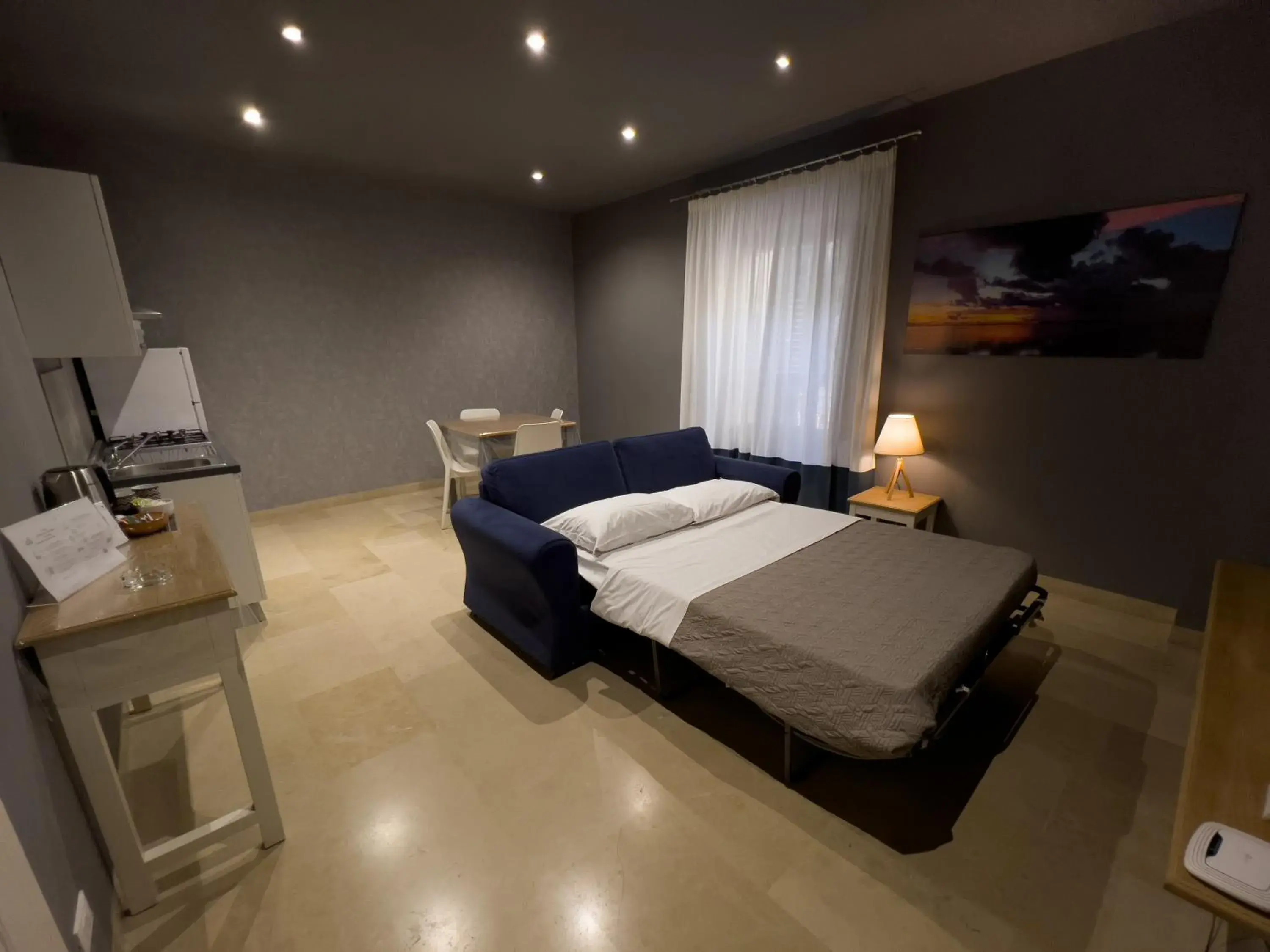 Living room, Bed in ZIBIBBO SUITES & ROOMS - XIX Palazzo Mauro