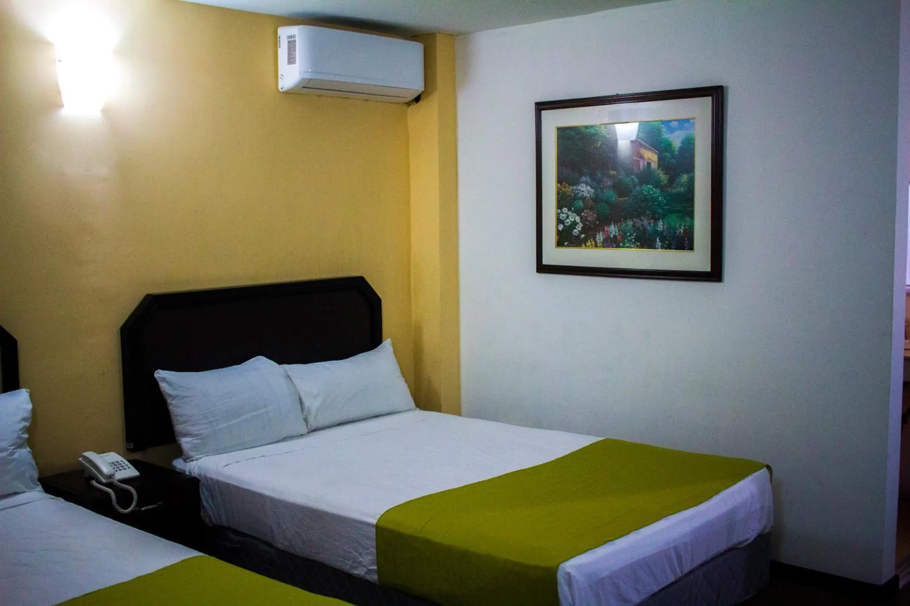 Bed in CHN Hotel Monterrey Santa Fe