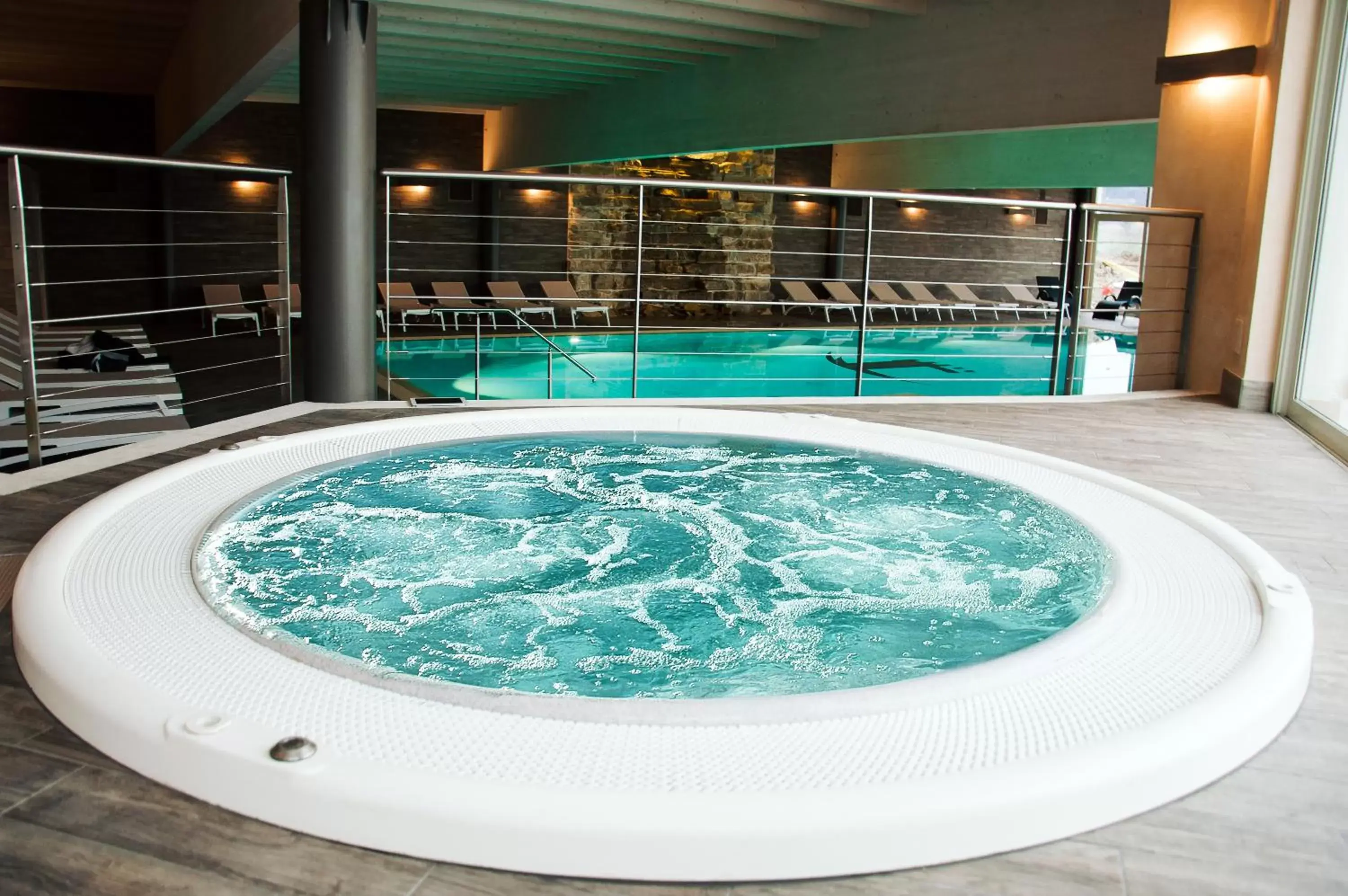 Hot Tub, Swimming Pool in Chervò Golf Hotel Spa, Resort & Apartment San Vigilio